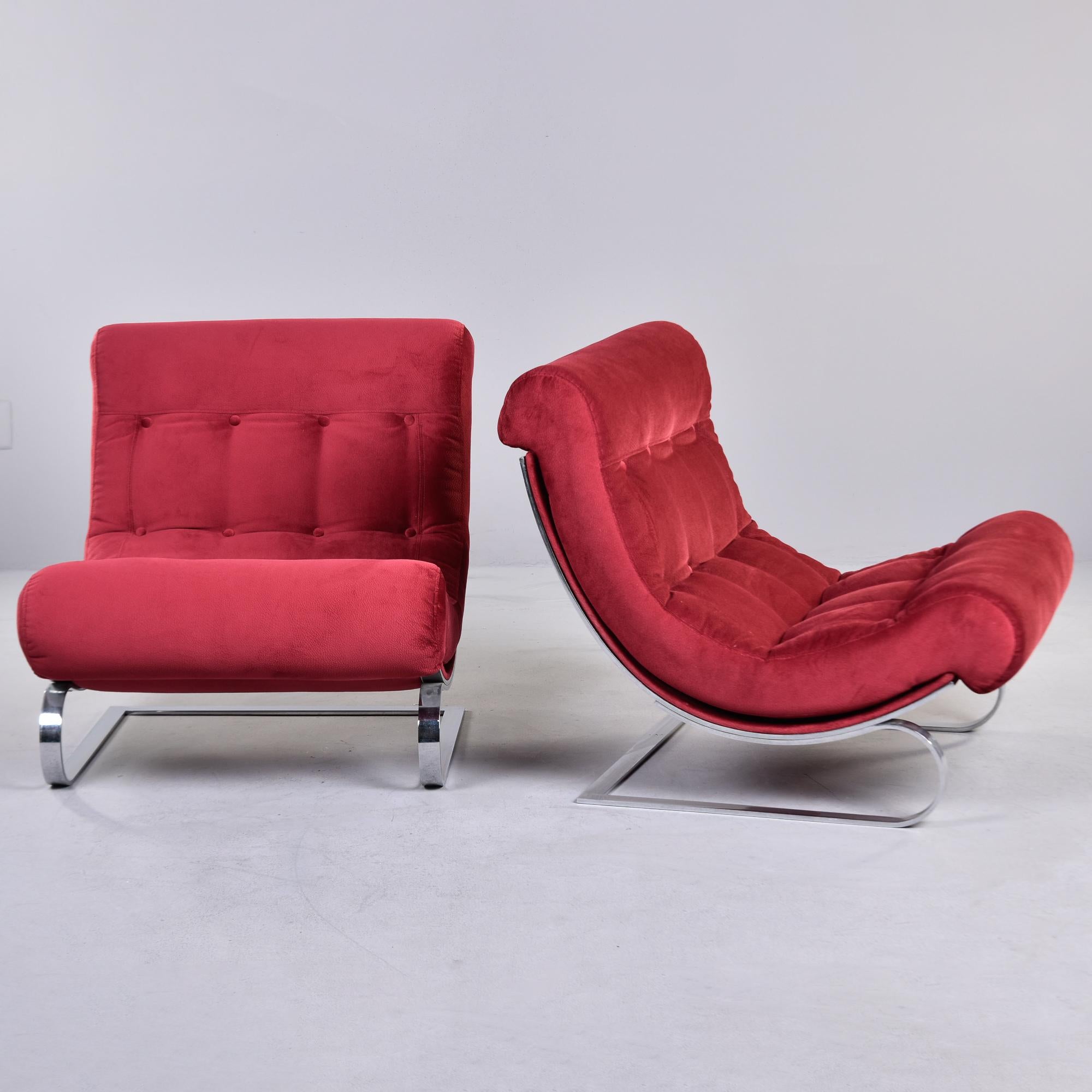 Found in Italy, this pair of lounge chairs date from the 1970s. These chairs feature a flat bar, cantilever chrome base with scoop form upholstered seats. New, red upholstery fabric with four rows of button tufting. Unknown maker. Sold and priced as