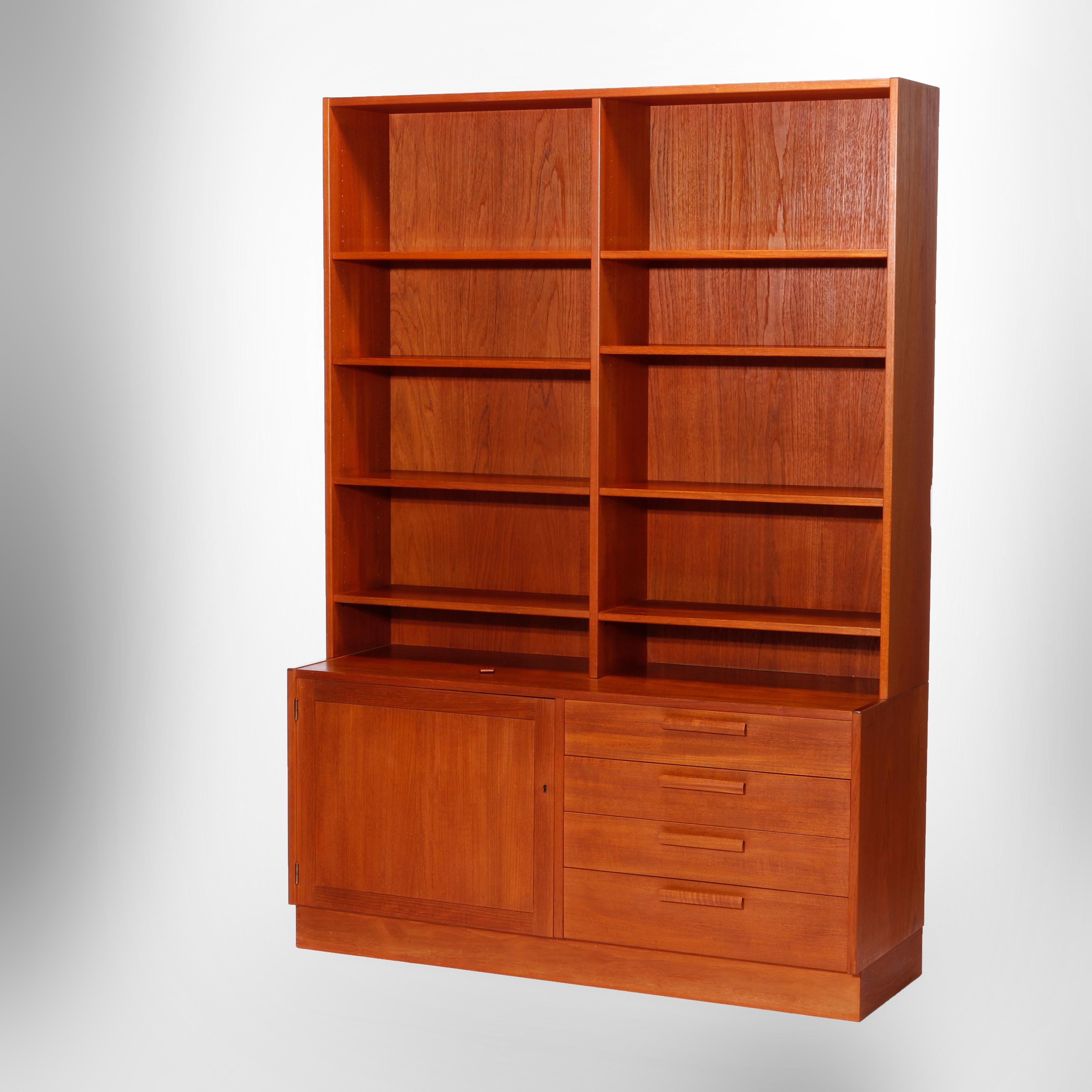A matching set of Mid Century Danish Modern bookcase sideboards offer teak wood construction with upper having open shelving surmounting lower with blind cabinet and drawer tower, c1960

Measures - 71.25'' H x 50'' W x 17.5'' D.

Catalogue Note: Ask