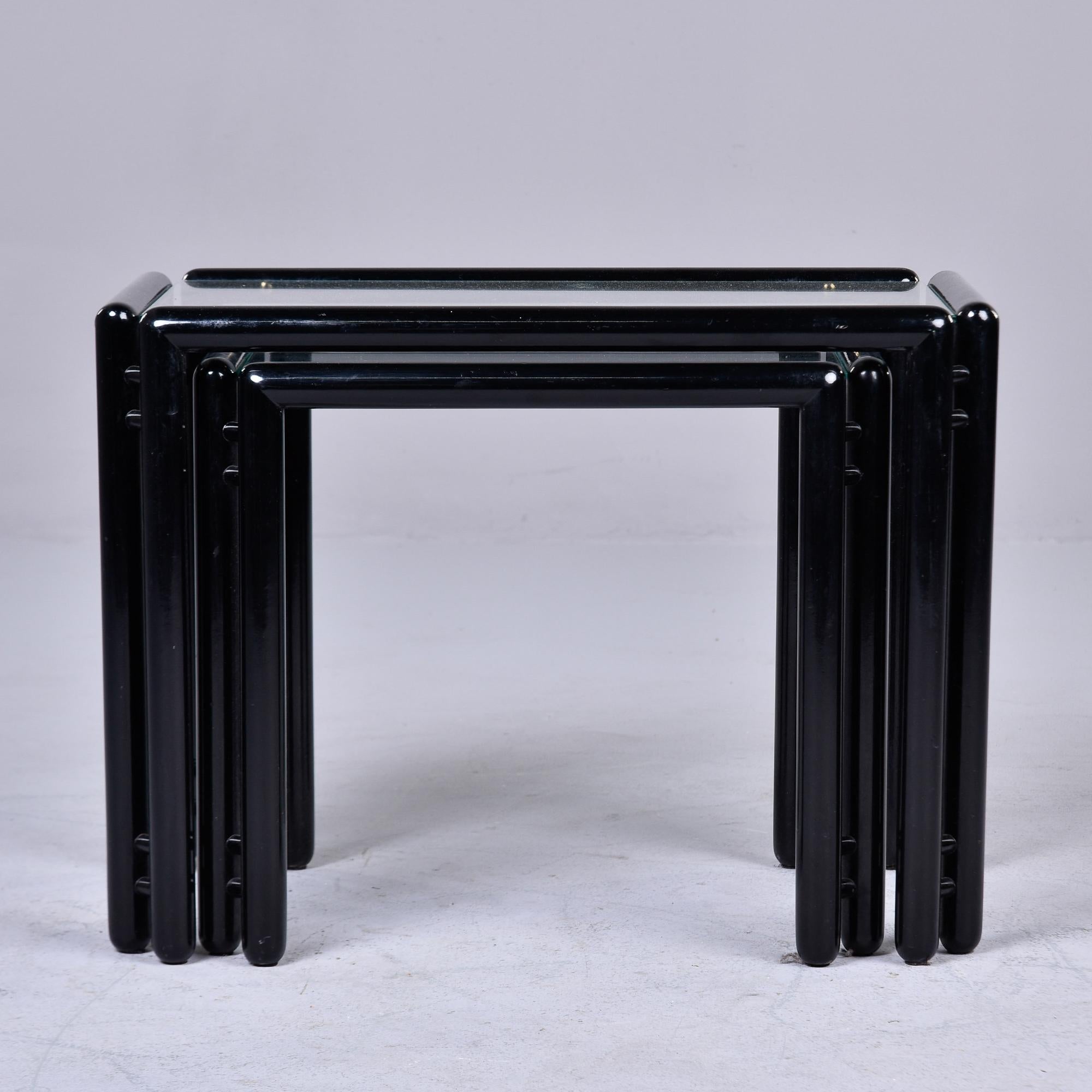 Italian Pair Mid Century Ebonised Stacking Tables with Glass Tops  For Sale
