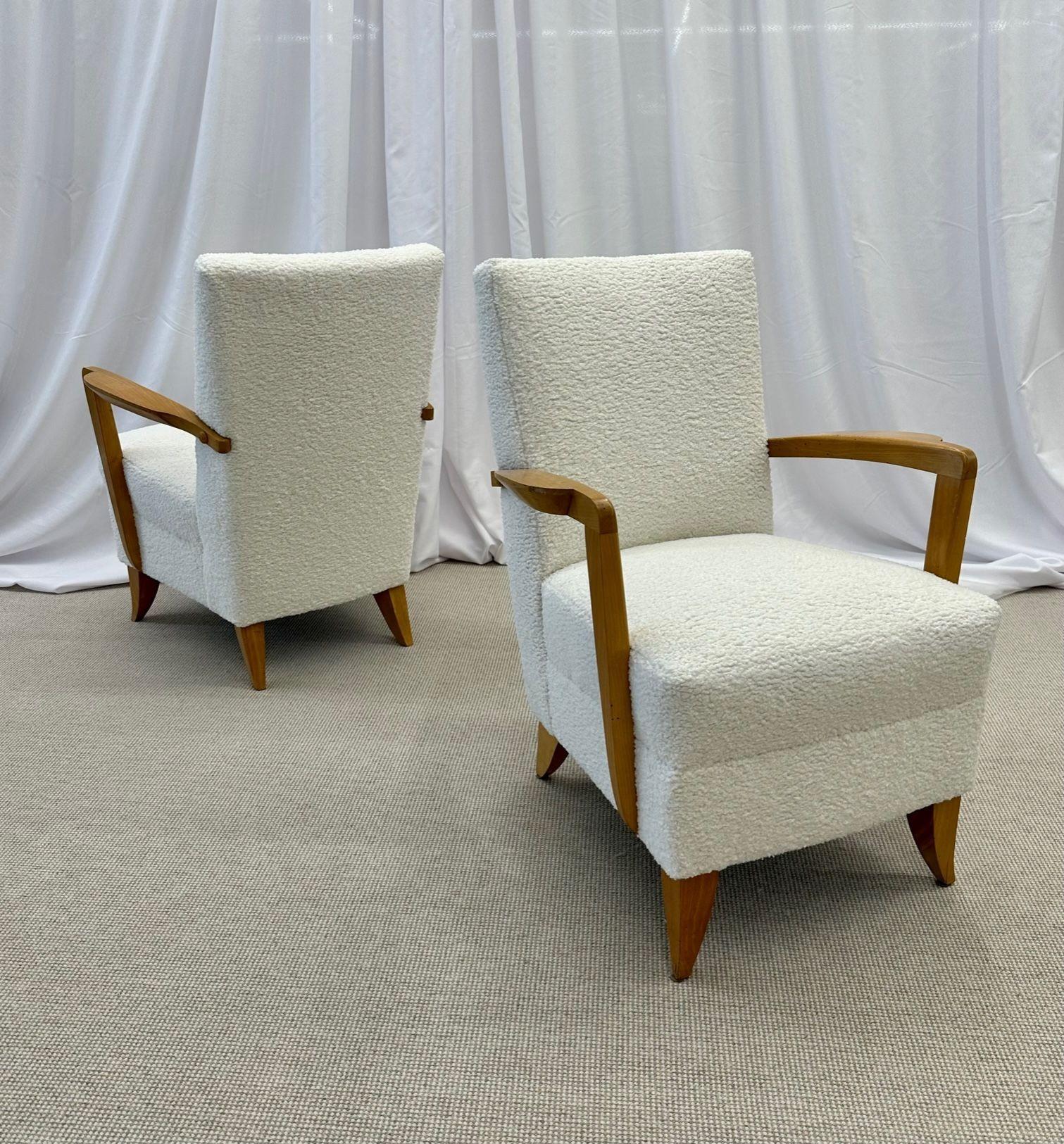 Pair mid-century French Art Deco Arm / lounge chairs by Maison Dominque, Boucle

Rare pair of chic French deco geometric accent chairs by Andre Domin and Marcel Genevriere for Maison Dominque; newly re-upholstered in a gorgeous white boucle textured