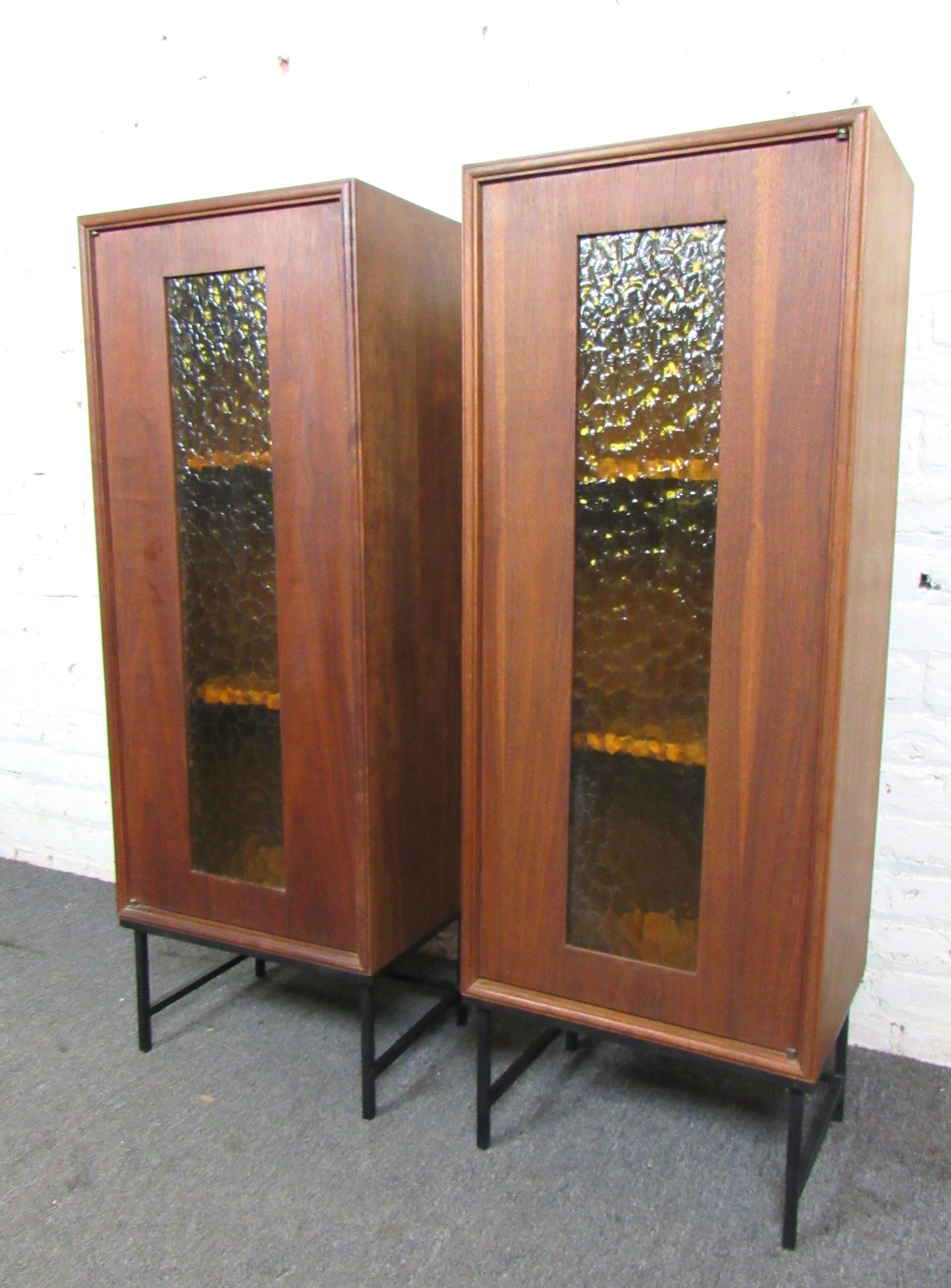 Unique pair of vintage modern glass front cabinets that light up from the inside. Amber toned glass gives a warm glow for your home.
(Please confirm location NY or NJ).