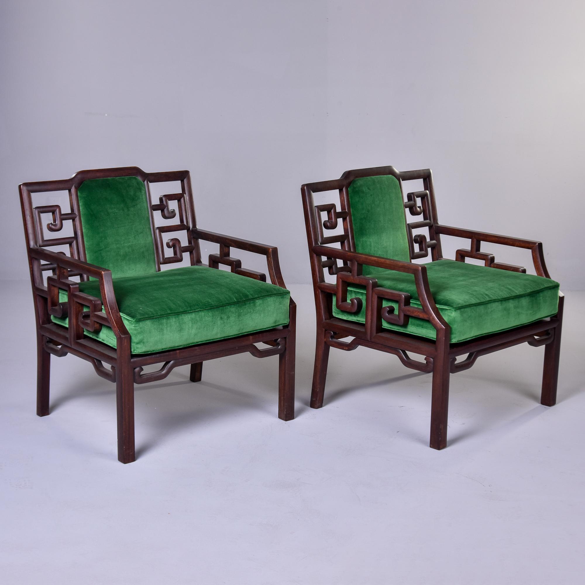 Found in the U.S., this pair of solid mahogany armchairs with rosewood veneers dates from the 1950s. Great lines and carved details in the manner of James Mont designs of the time. We don’t know who made these chairs, but they are very good quality
