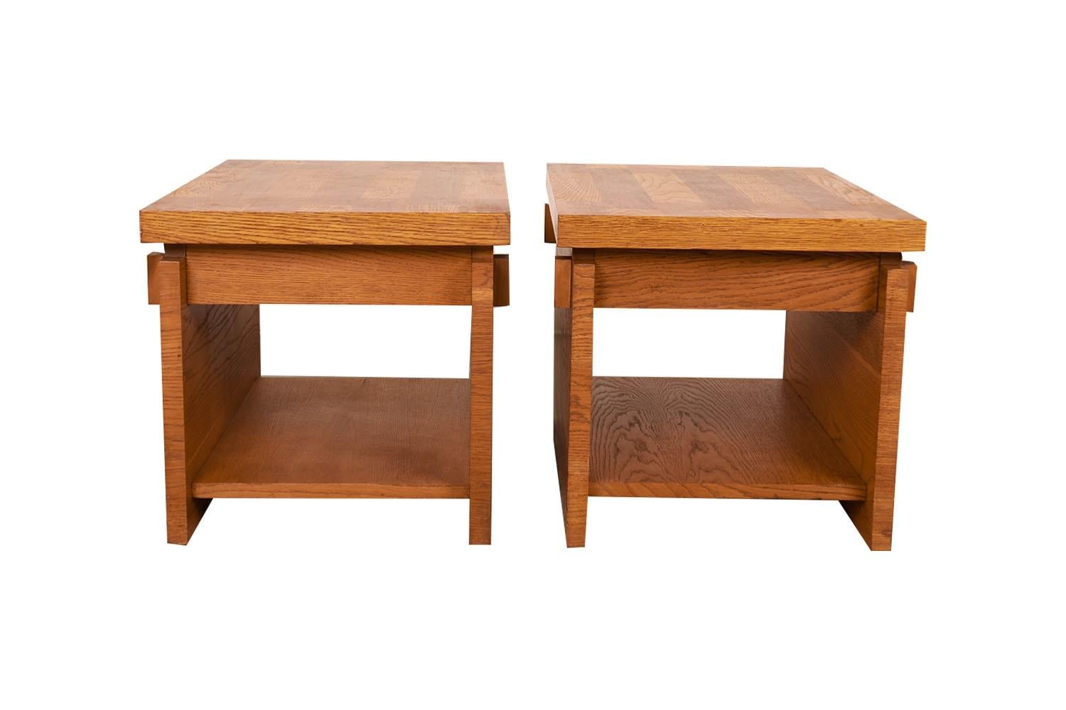 A beautiful pair of end tables / nightstands by Lane Furniture Co. in a chunky Brutalist style each remains in beautiful condition throughout. Featuring semi parquet oak on top, in a vivid contrast against the surface.  Each with a dramatic, wide