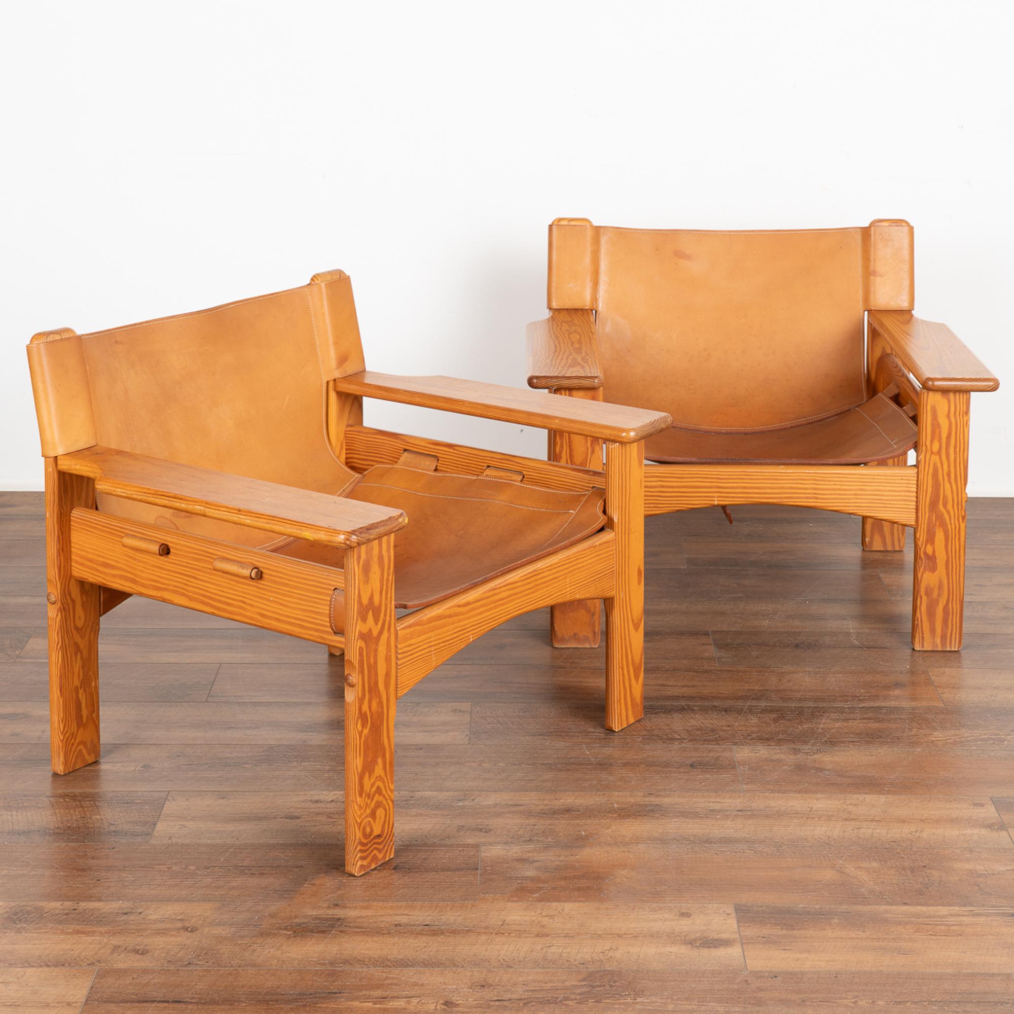 Pair, Mid Century Leather Sling Lounge Chairs, Karin Mobring Sweden 1970's
A pair of mid-century Scandinavian pine lounge chairs with full grain stitched cognac leather sling seat and back; Karin Mobring for Ikea Sweden 1970s.
Sold in used vintage