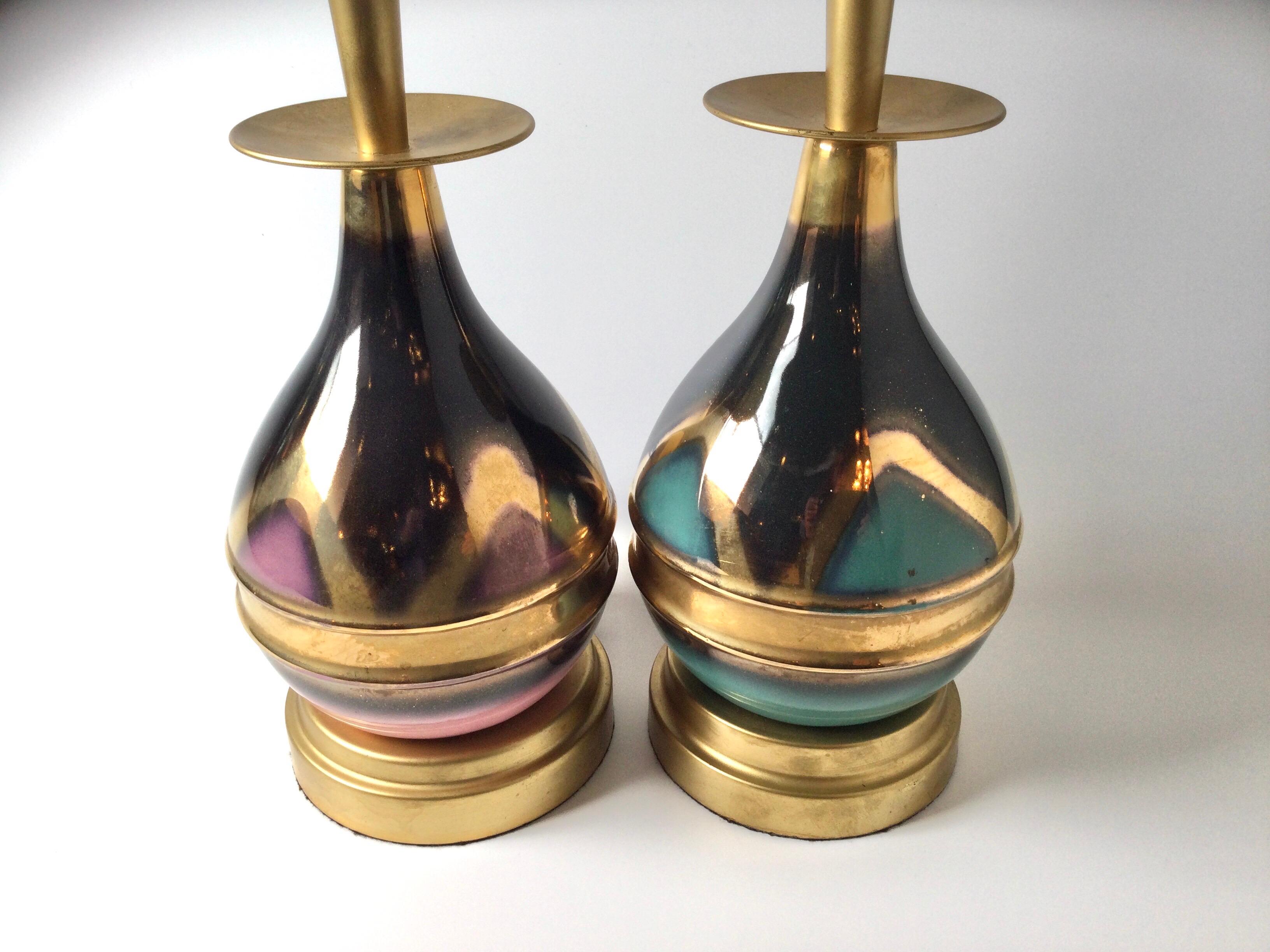 Great Mid-Century Modern lamps. Metal and metallic porcelain lamps. Brushed gold metal with one aqua metallic base and one rose pink metallic base. Measures: 32