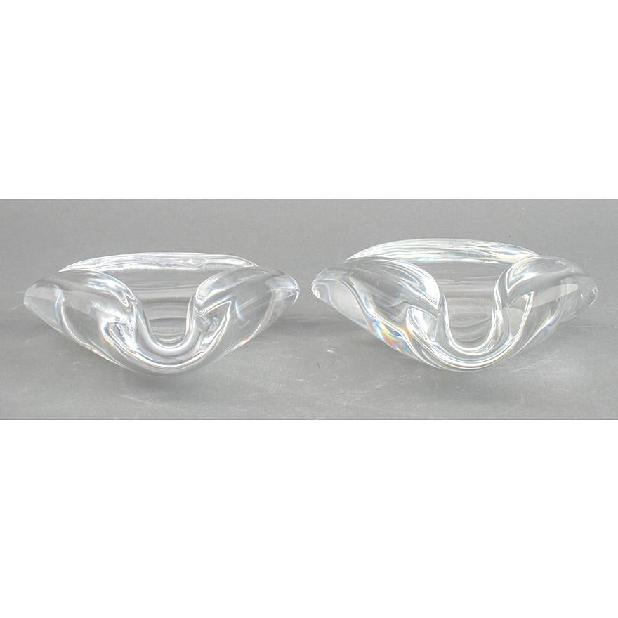 Elevate your smoking experience with this exquisite pair of Mid-Century Modern Baccarat Geometric shaped Crystal Cigar Ashtrays. Meticulously crafted, each ashtray is a testament to the artistry and precision that defines Baccarat crystal. The