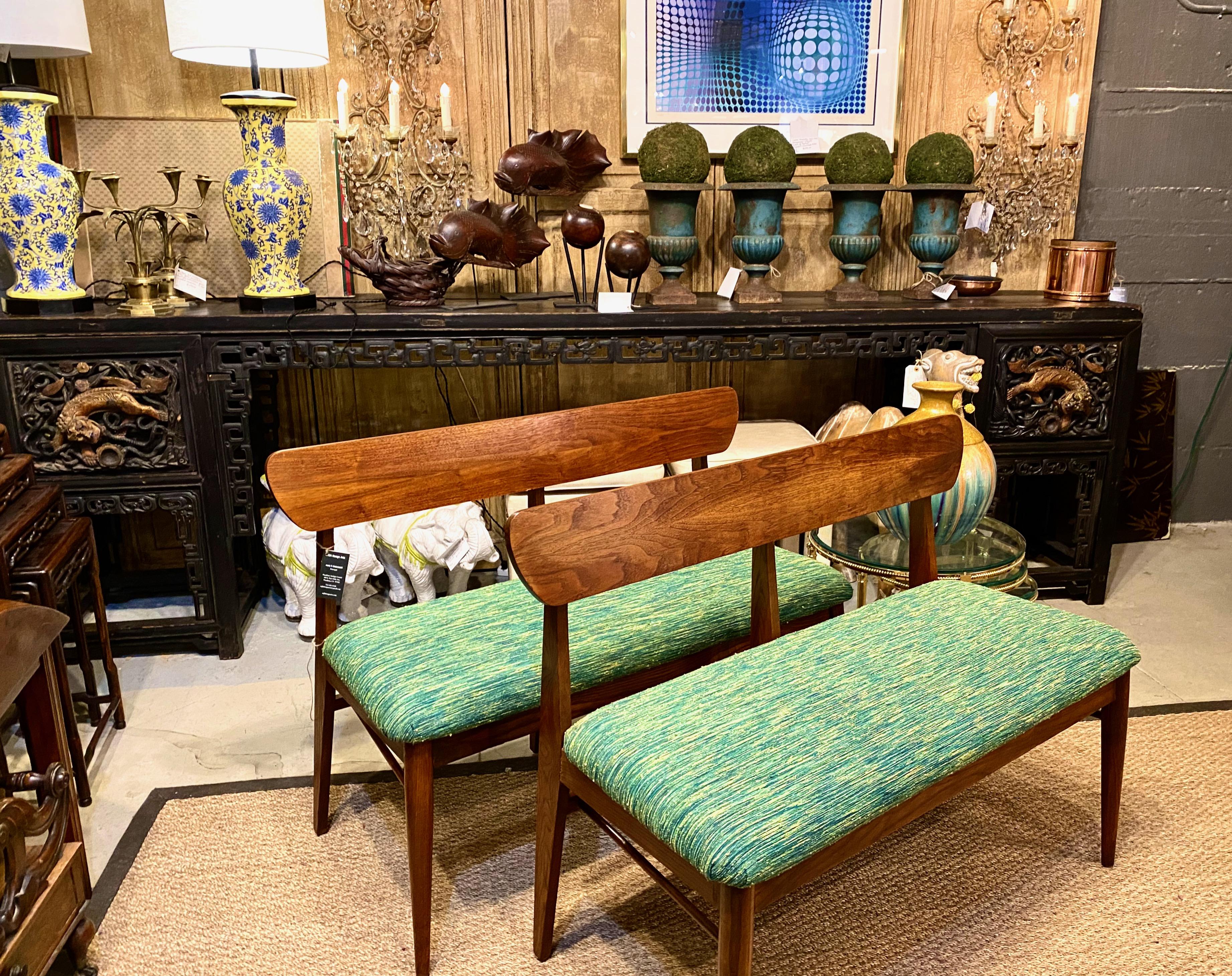 This is a great pair of mid-century back bench in a Scandinavian Modern design. The benches retain their original wood surface and have been newly upholstered in a Knoll fabric that coordinates well with the modern frames. Pairs of modern benches