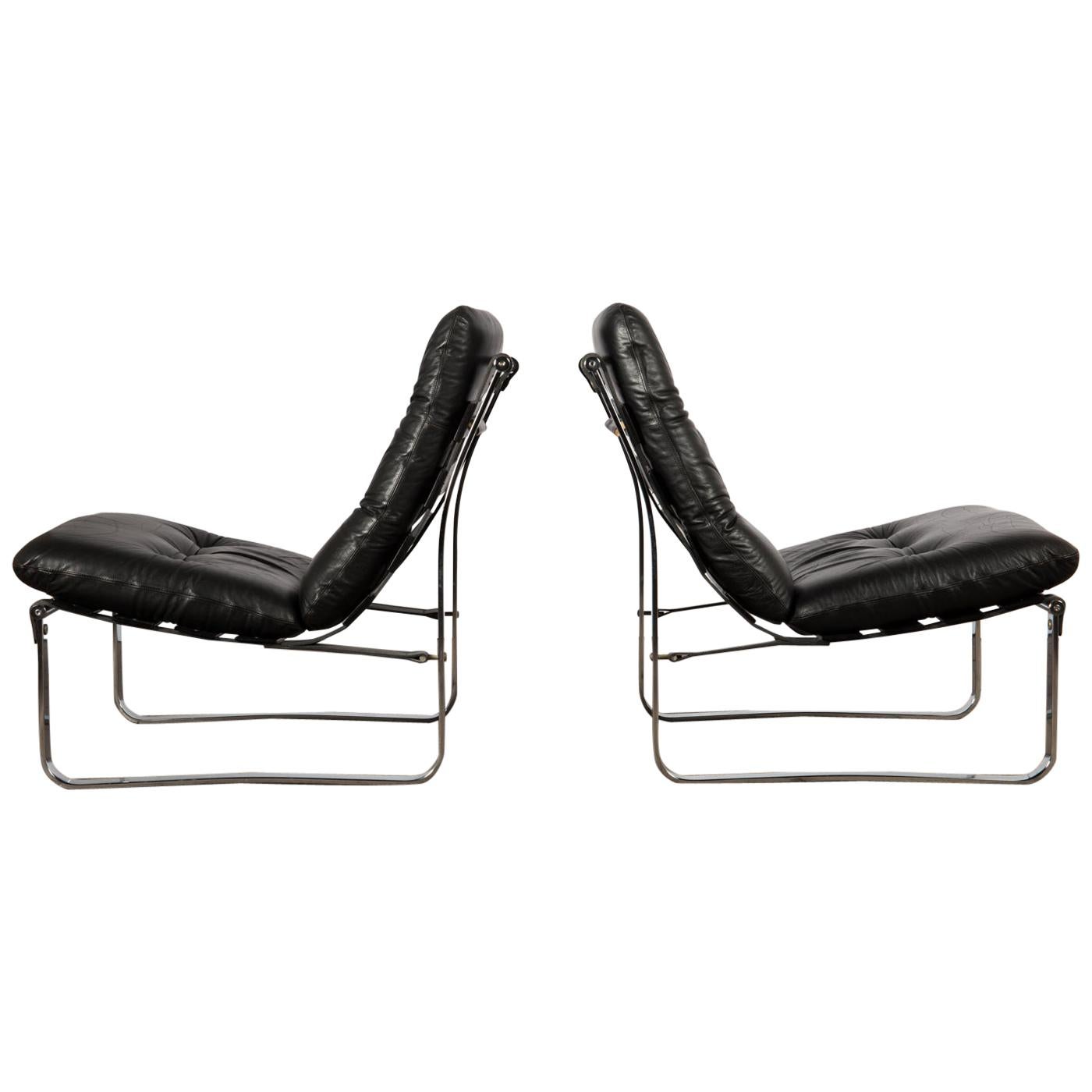 Pair of Mid-Century Modern, Black Leather Spring Lounge Chairs by Ingmar Relling For Sale