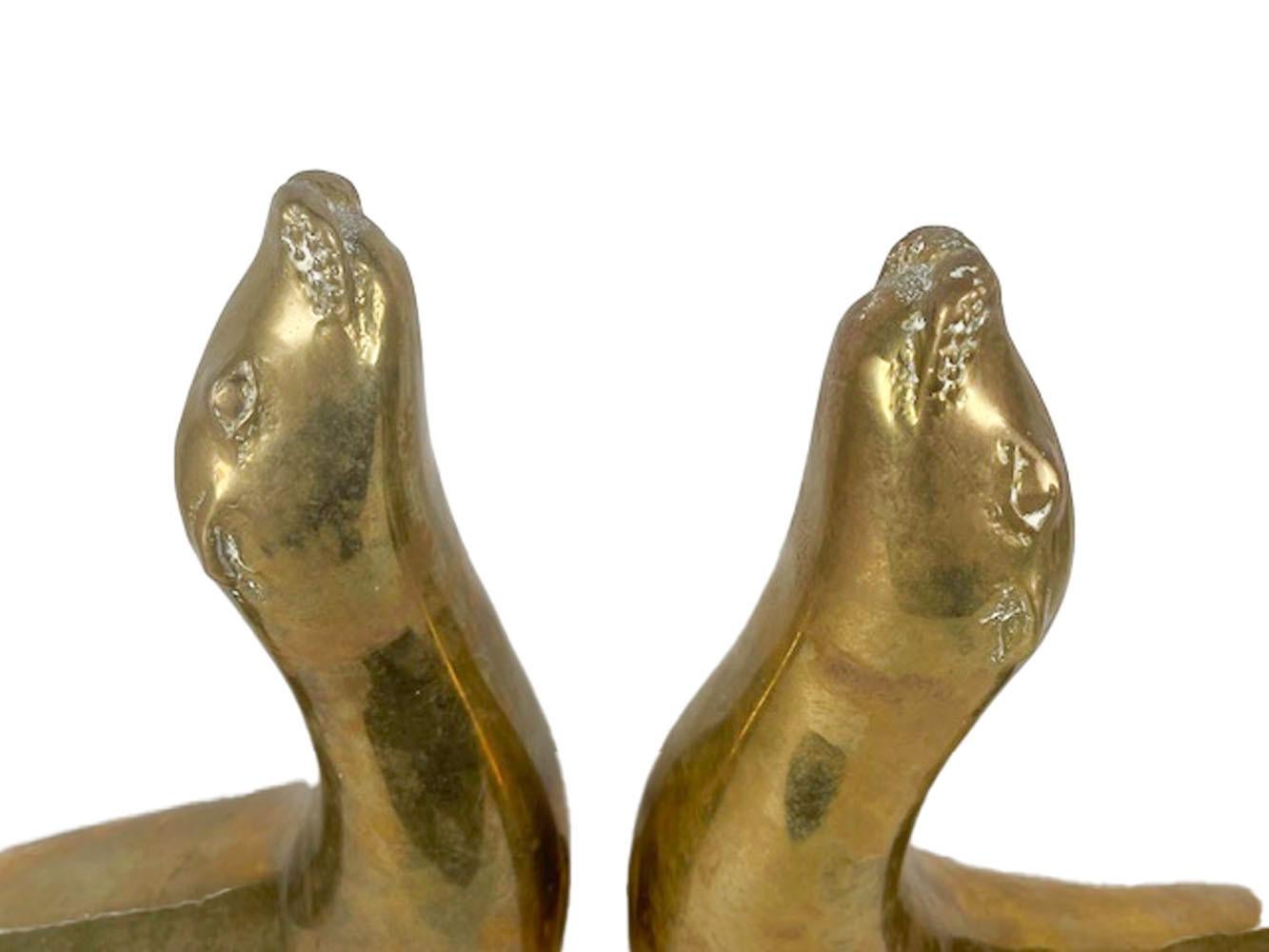 Spanish Pair Mid-Century Modern Cast Brass Figures of Seals with Noses Pointed Up For Sale