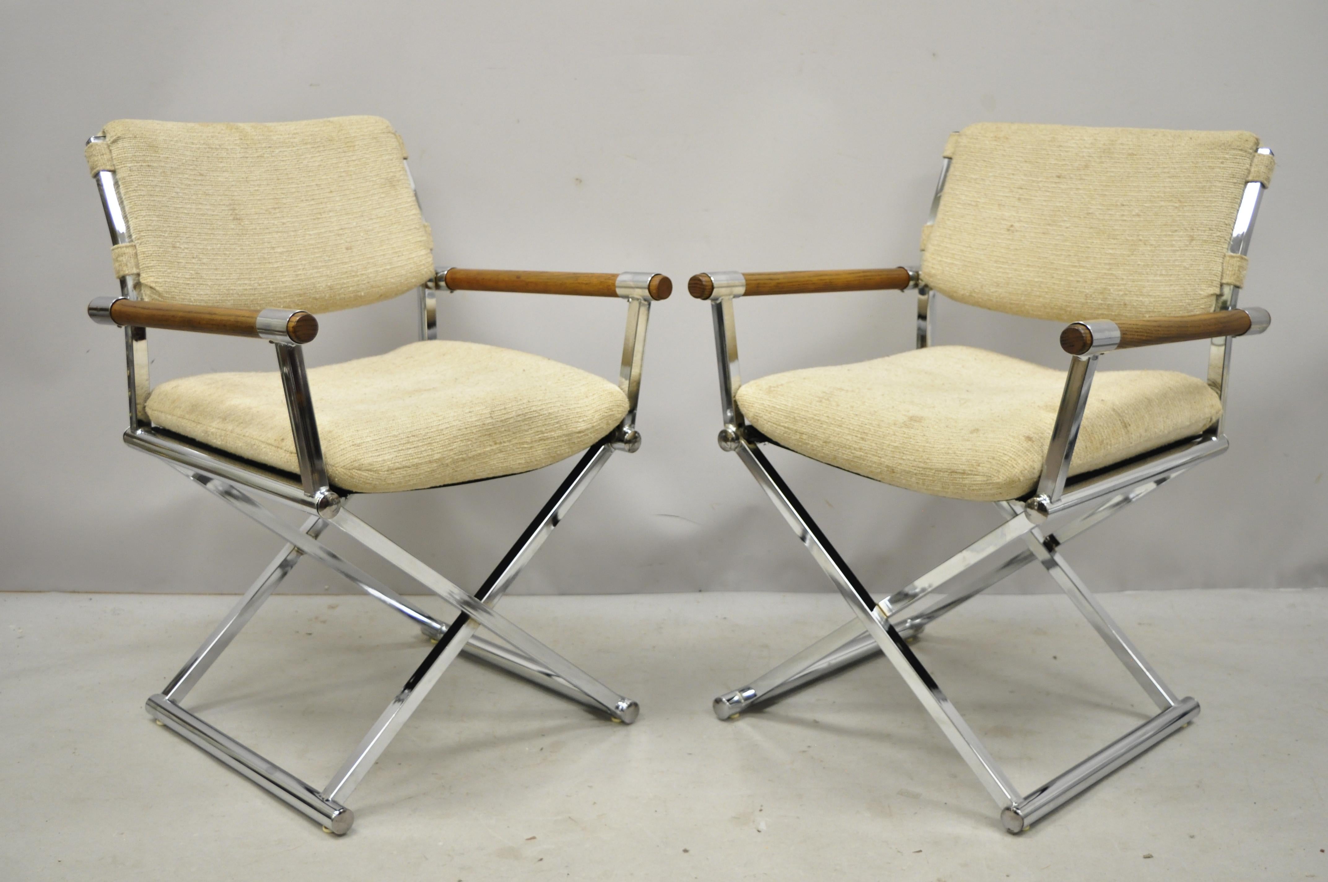 Pair of Mid-Century Modern chrome X-frame directors armchairs Cal Style Furn. (A). Item features chrome metal frames, solid wood arms, X-frame base, original label, clean modernist lines, sleek sculptural form, circa late 20th century. Measurements: