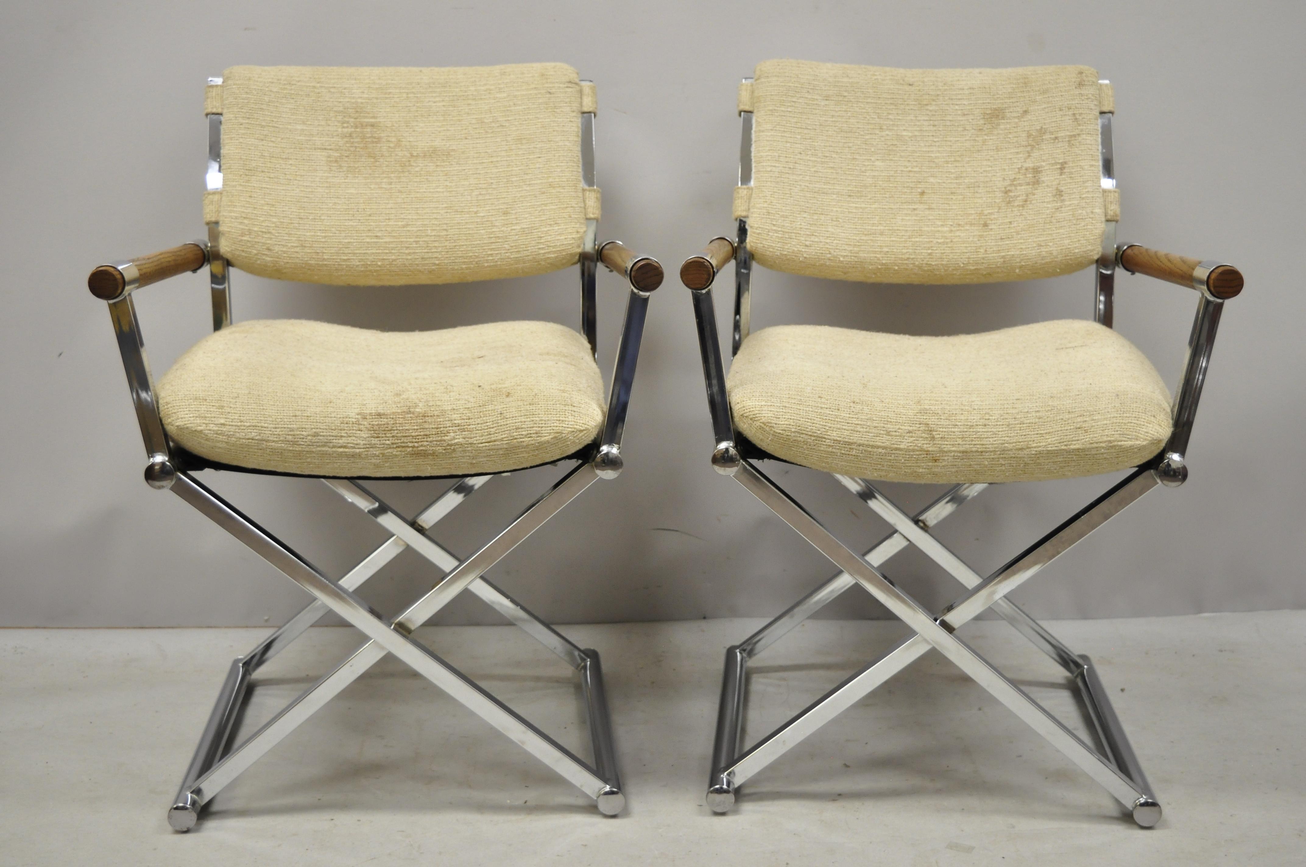 Pair of Mid-Century Modern chrome X-frame Directors armchairs Cal Style Furn. (B). Item features chrome metal frames, solid wood arms, X-frame base, original label, clean modernist lines, sleek sculptural form, circa late 20th century. Measurements: