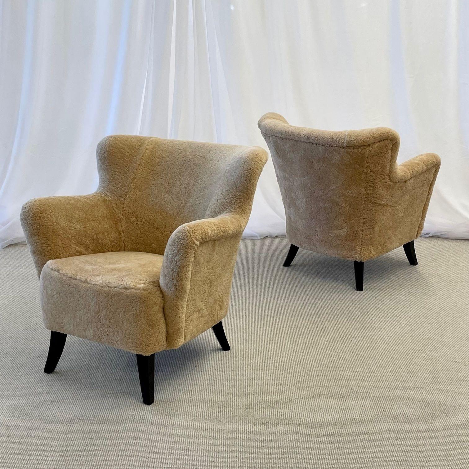 European Danish Mid-Century Modern, Lounge Chairs, Sheepskin, Ebonized Wood, 1950s For Sale