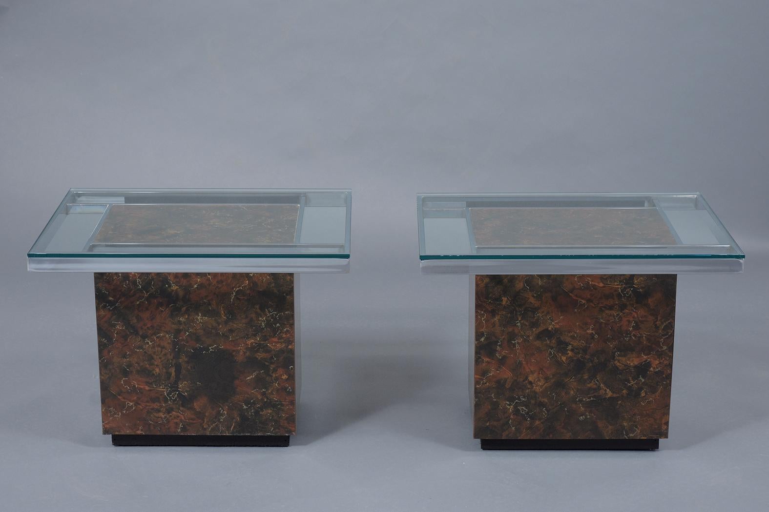 Elevate your interior with our pair of Mid-Century Modern Side Tables, a perfect representation of the era's iconic design aesthetic. Hand-crafted with a combination of steel and Formica, these end tables are in great condition and feature a unique