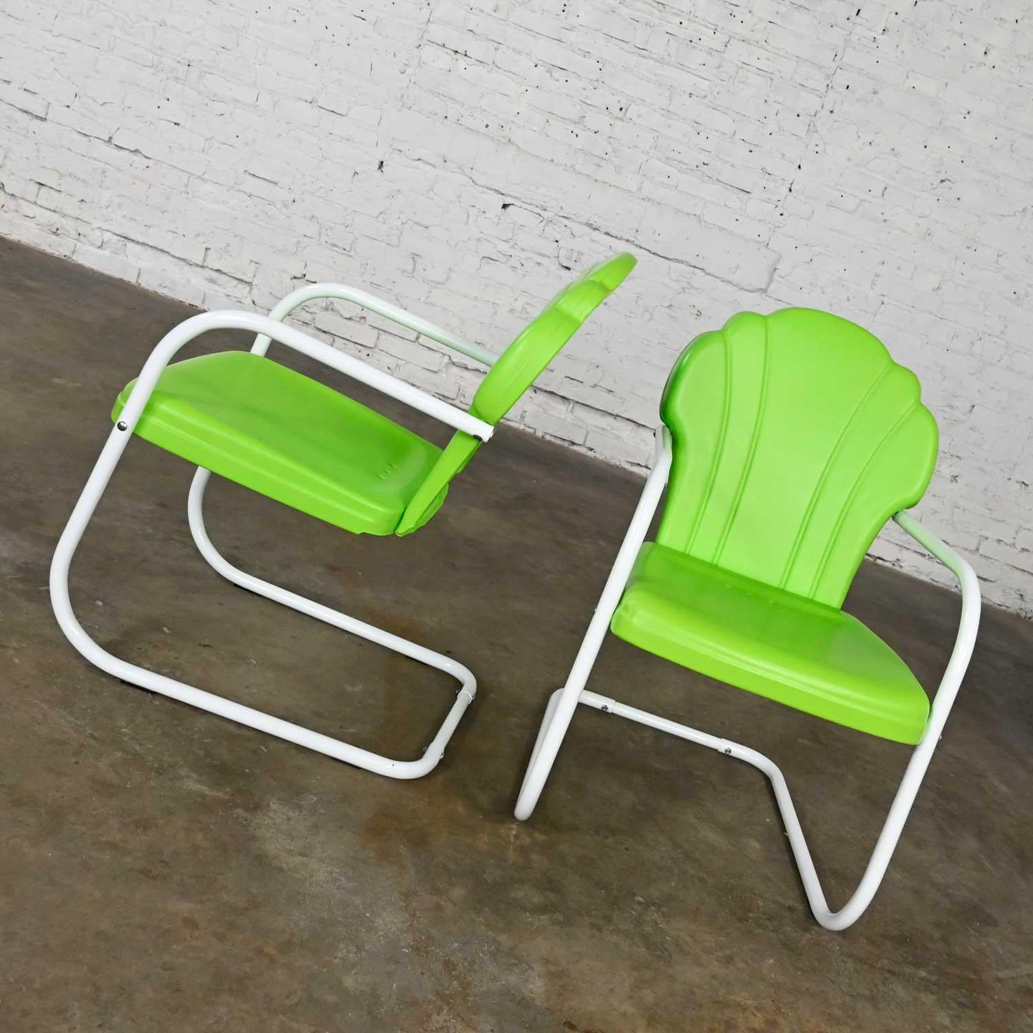 Awesome vintage Mid-Century Modern green & white powder coated metal outdoor cantilever springer chairs. Beautiful condition, keeping in mind that these are vintage and not new so will have signs of use and wear. These chairs have been media blasted