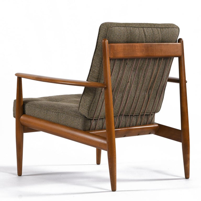Danish made, mid-century modern, beech wood armchairs by Grete Jalk for John Stuart / France Daverkosen. Jalk’s classic chair designs have become the standard for Danish mid-century modern armchairs. These two are particularly special. Loop coil