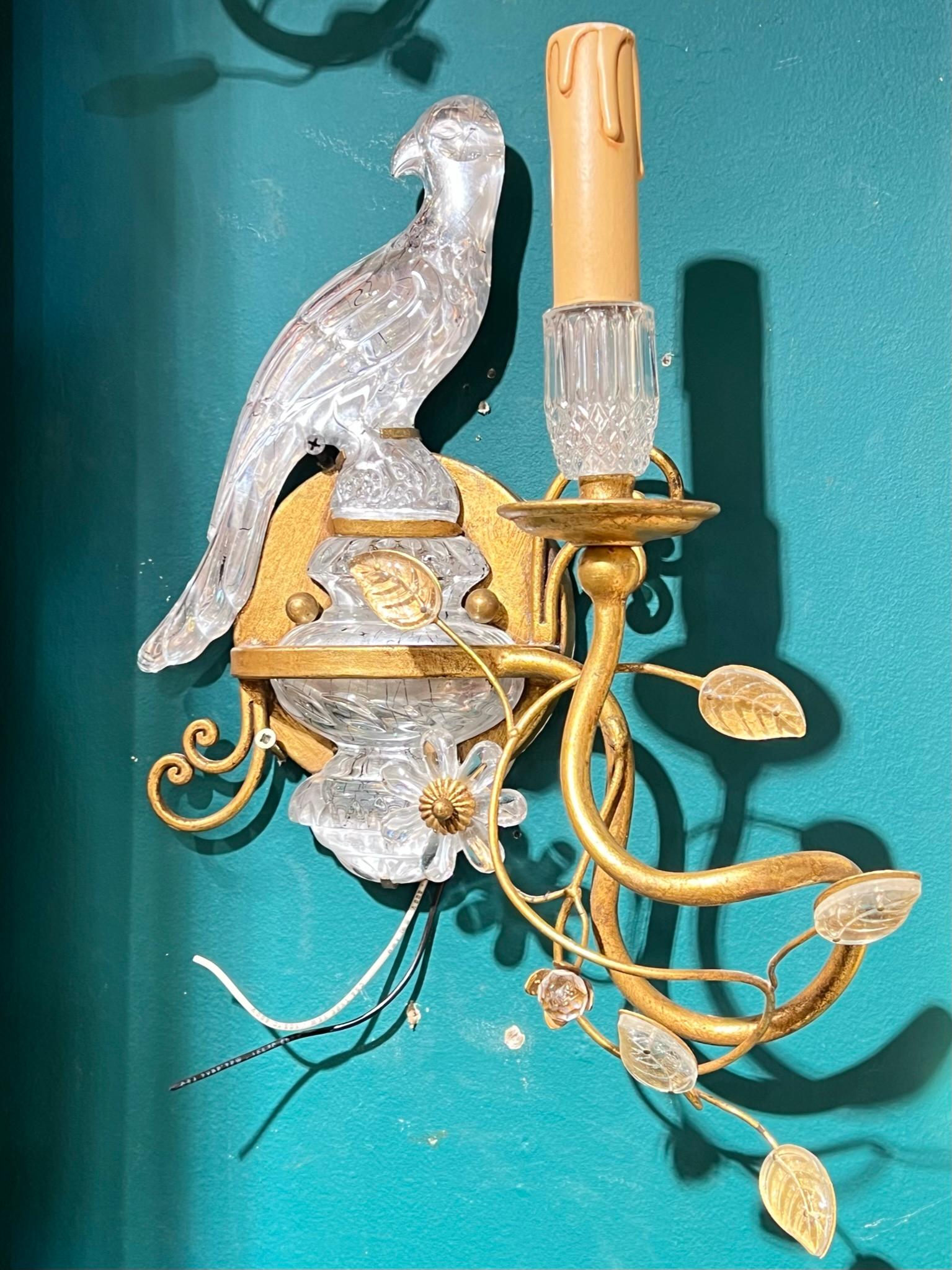 Pair vintage midcentury gilt metal wall lights with glass parrot figures, glass leaves and faux wax candle covers, attributed to Banci of Italy. Wired and ready for use.
