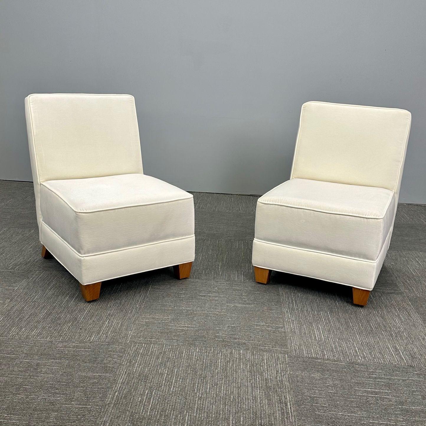 Pair Mid-Century Modern Jean-Michel Frank Style Lounge / Slipper Chairs, Mohair
 
A Custom pair of White Mohair, Stained Oak side chairs after a copy by Jean Michel Frank. The pair having new mohair upholstery on bracket birch feet. Handmade in