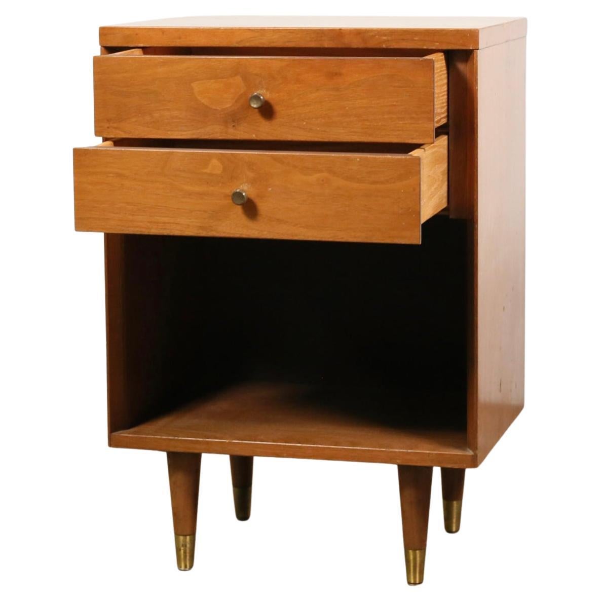 Stunning pair of Mid-Century Modern John Stuart Widdicomb walnut 2 drawer nightstands Brass Knobs and Pull Handles. Walnut wood. Very clean set of nightstands inside and out all drawers are clean and slide smooth. Very high quality construction.