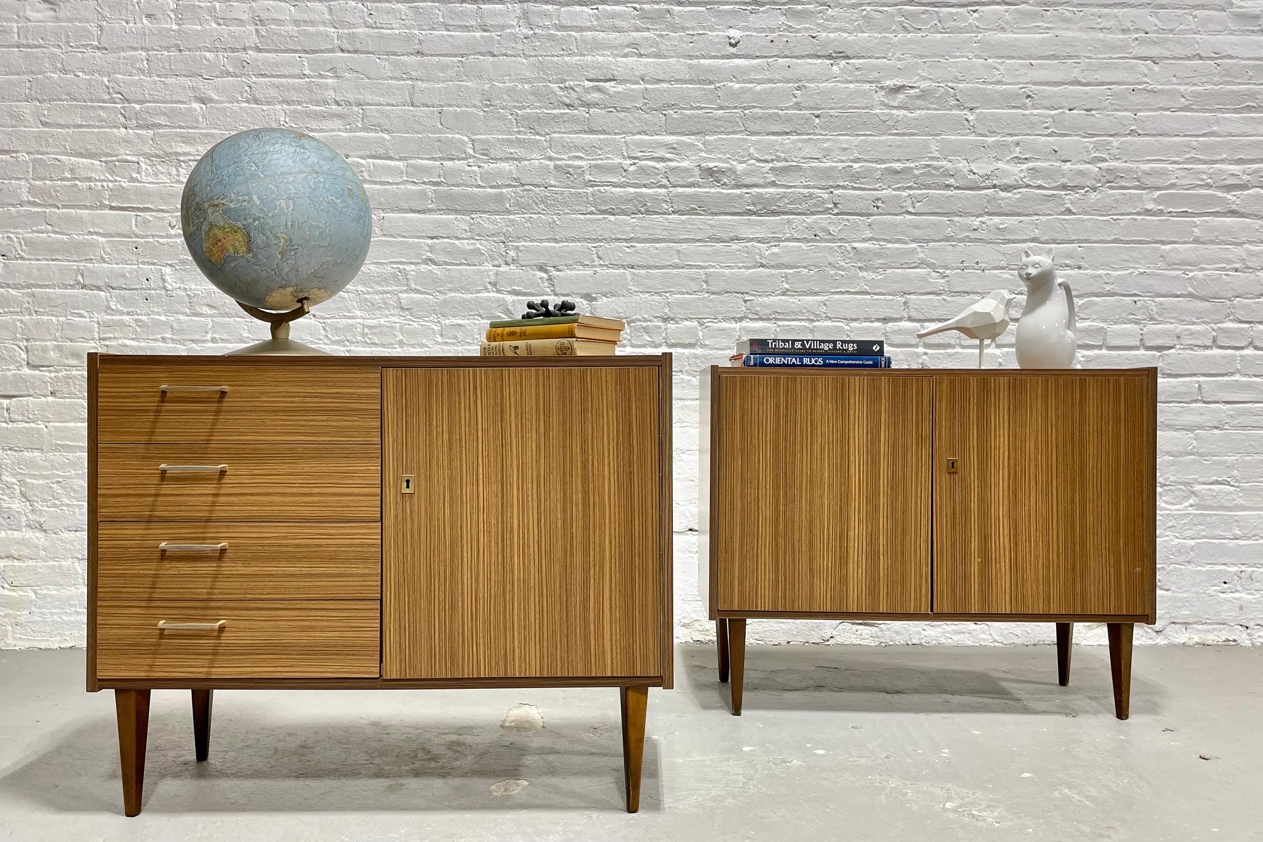 Perfect Pair of Mid Century Modern Laminate Petite credenzas / cabinets, Made in Germany, c. 1960's. Great option for those with smaller spaces yet needing the full offerings of a credenza or vinyl storage. Measurements are identical yet one cabinet