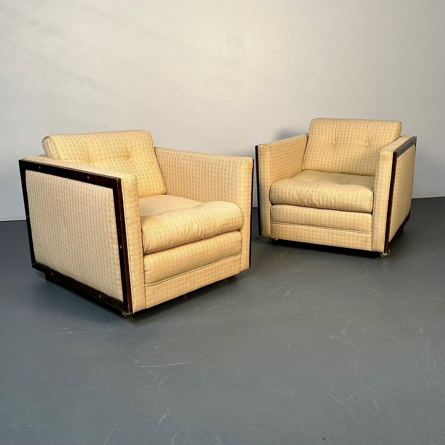 Pair Mid-Century Modern Lounge / Club Chairs, George Nelson Style, Box-Form
 
A sleek and stylish pair of Mid-Century Modern large lounge or club chairs. Each having a wood trim on all sides and rolling casters. These cube form George Nelson