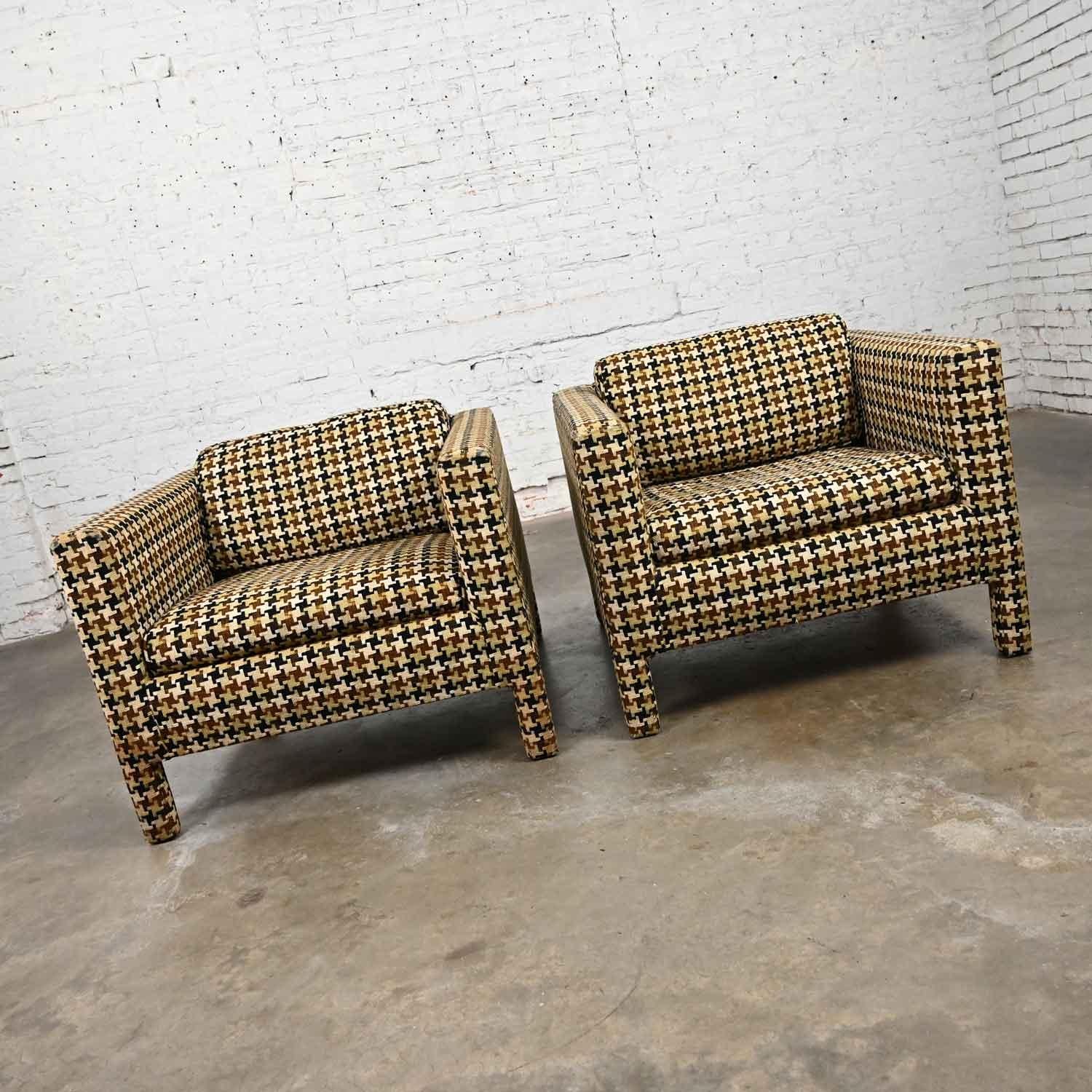Handsome vintage mid-century modern to modern Parson’s style cube club chairs wearing houndstooth fabric a pair. Good condition, keeping in mind that these are vintage and not new so will have signs of use and wear. There are stains and wear on the
