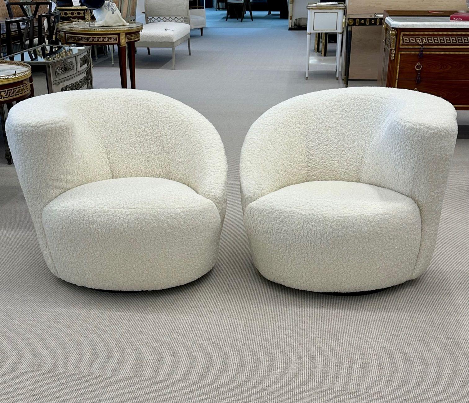 Pair Mid-Century Modern Nautilus Swivel Chairs, Vladimir Kagan for Directional
 
The pair having new boucle fabric on large swivel bases. Bearing the original Directional tag. 
 
Other American designers of the period include Milo Baughman, Paul