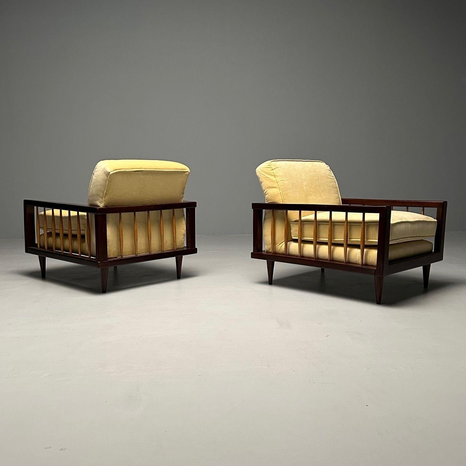 Pair Mid-Century Modern Paolo Buffa Style Arm / Lounge Chairs, Mahogany and Oak

Two mid-century style arm or lounge chairs similar in form to the work of Italian designer, Paola Buffa. The frames and legs are mahogany and the slats within the frame