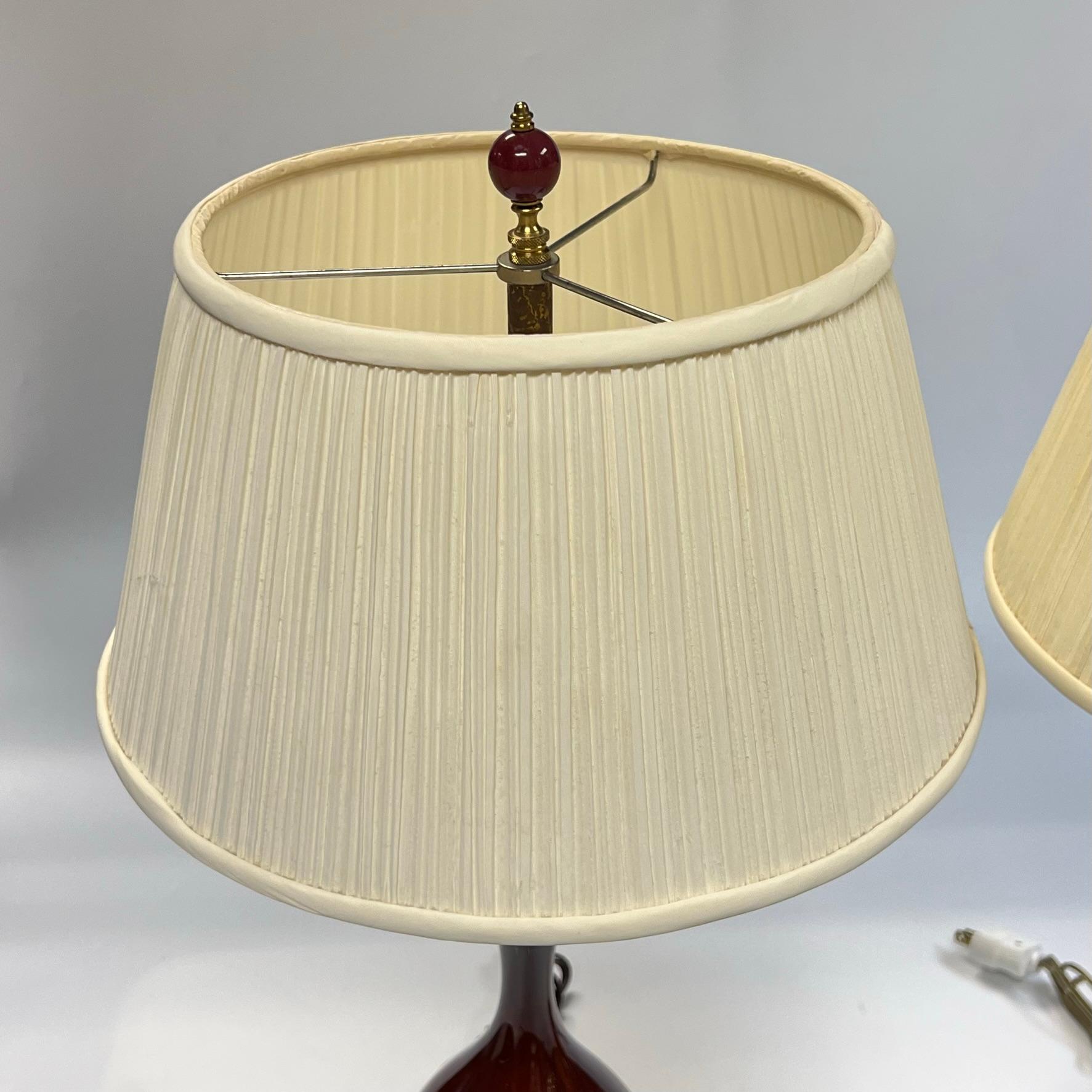 Pair Mid-Century Modern Porcelain Table Lamps with Sang de Boueuf Glaze In Good Condition For Sale In New York, NY