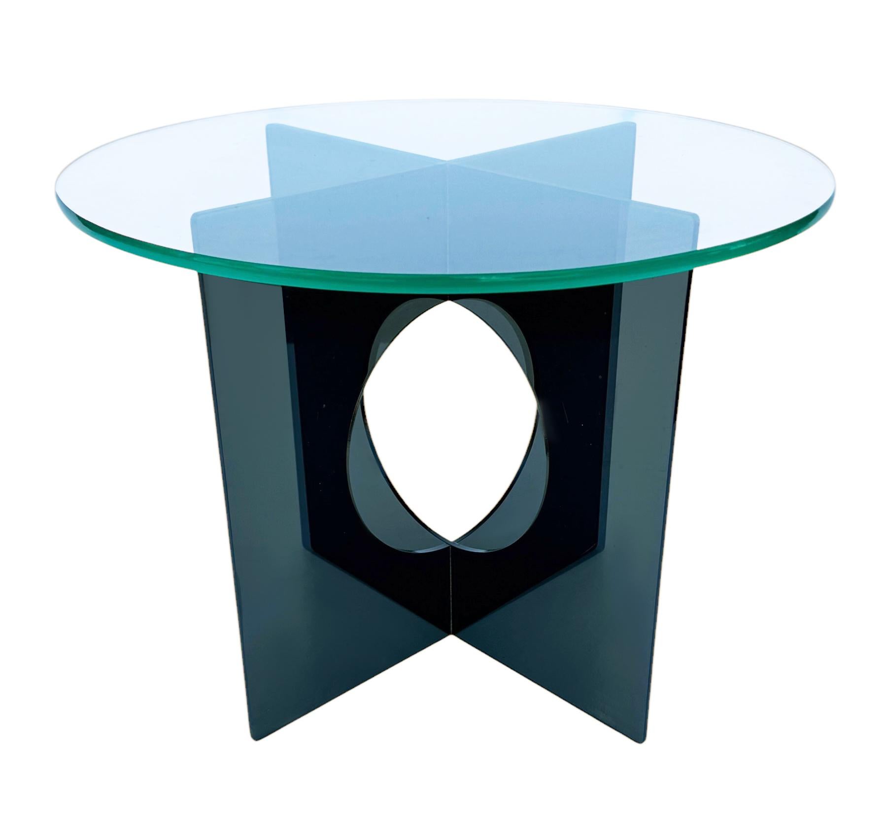 An incredible design in smoked acrylic from the disco mod days, circa 1970s. The tables features a smoked acrylic X-base design and thick clear glass tops. In very good condition. 