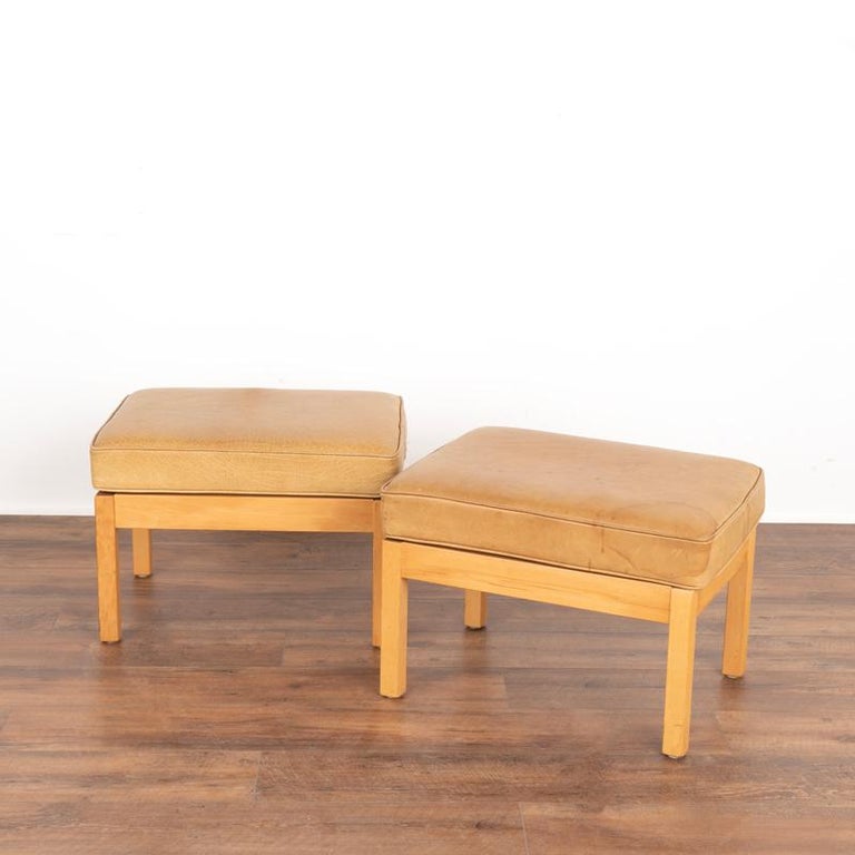 20th Century Pair, Mid Century Modern Vintage Tan Leather Wingback Armchairs and Matching Ott For Sale
