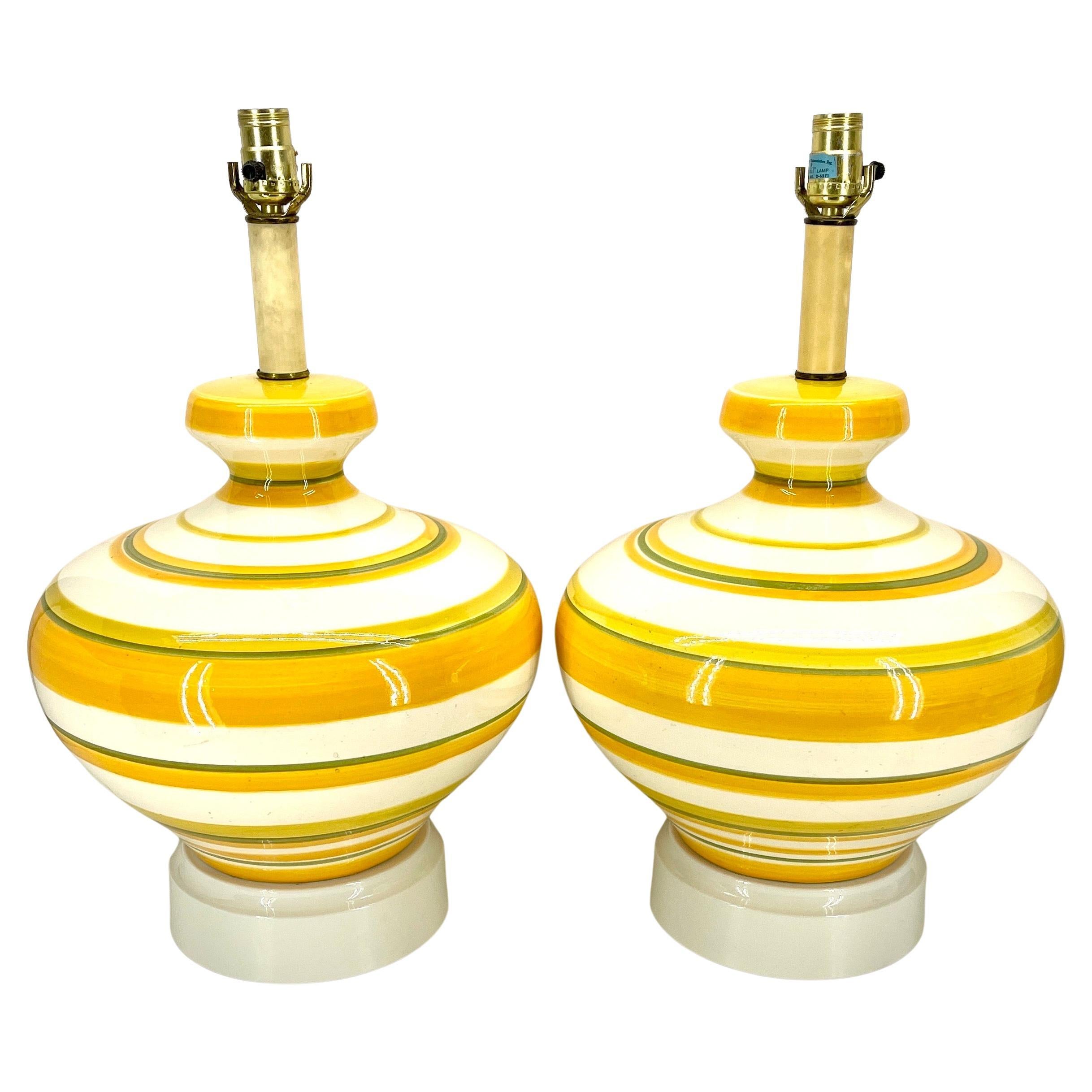 Large Mid-Century Modern Pair of Green and Yellow Striped Ceramic Table Lamps, circa 1960's

Substantial in size, these striped pair of lamps are perfect for the room seeking that Mid-Century vibe. This set is impressive and extremely well made with