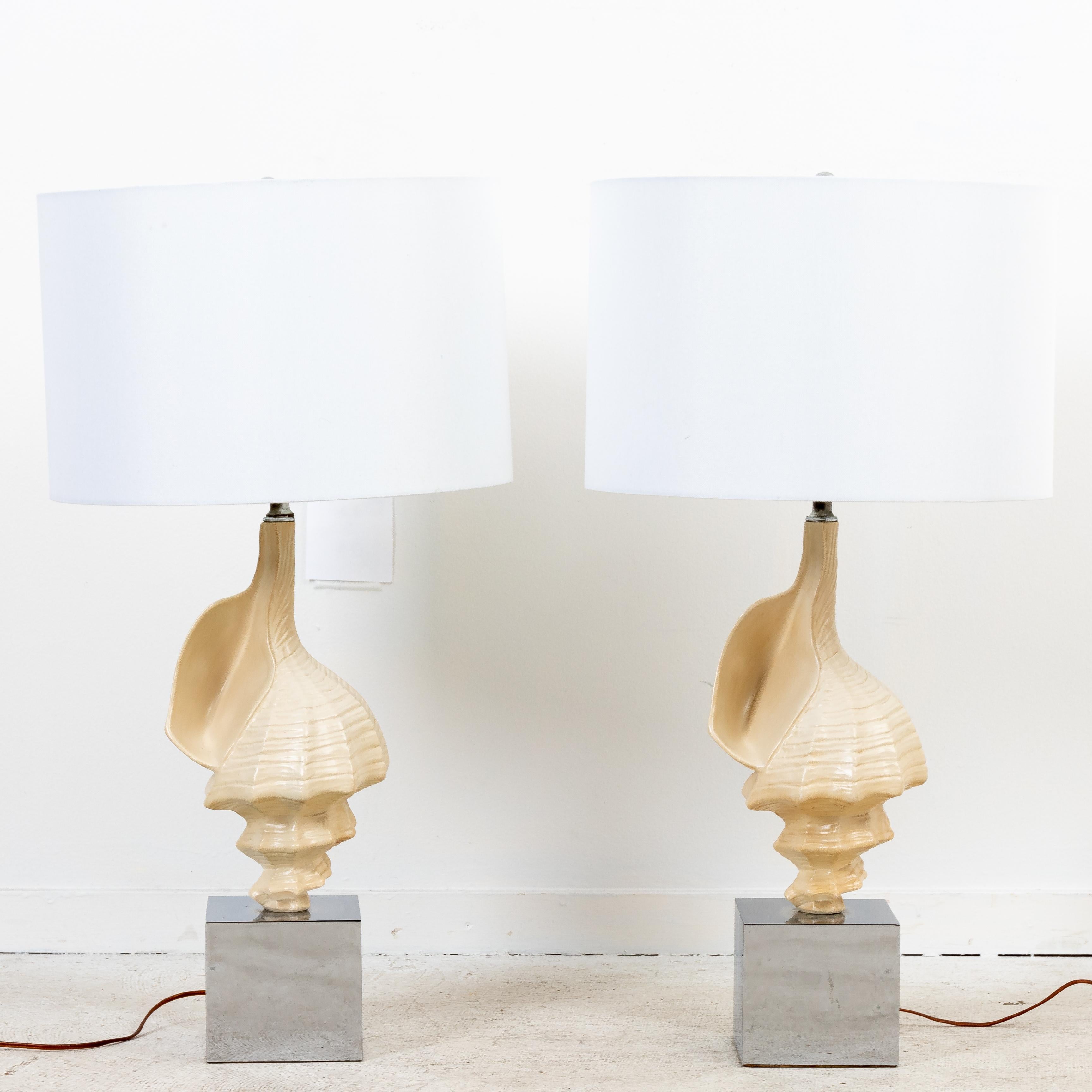 Amazing pair of midcentury ceramic seashell lamps mounted on chrome cube bases. 25