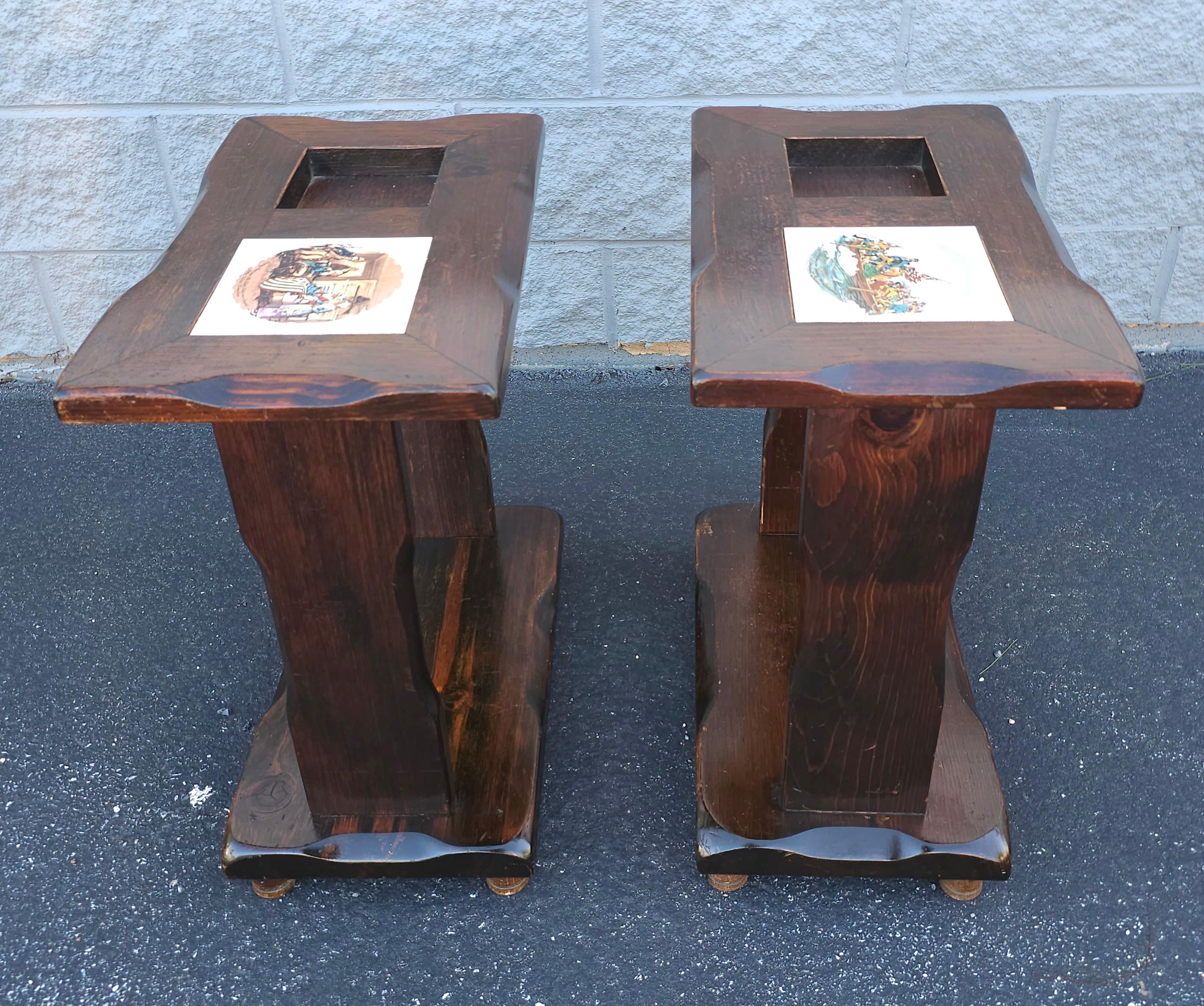 A Pair of Mid-Century Old Tavern Style Antiqued Pine Two-Tier  Side Tables with decorative ceramic inserts. Measures 12