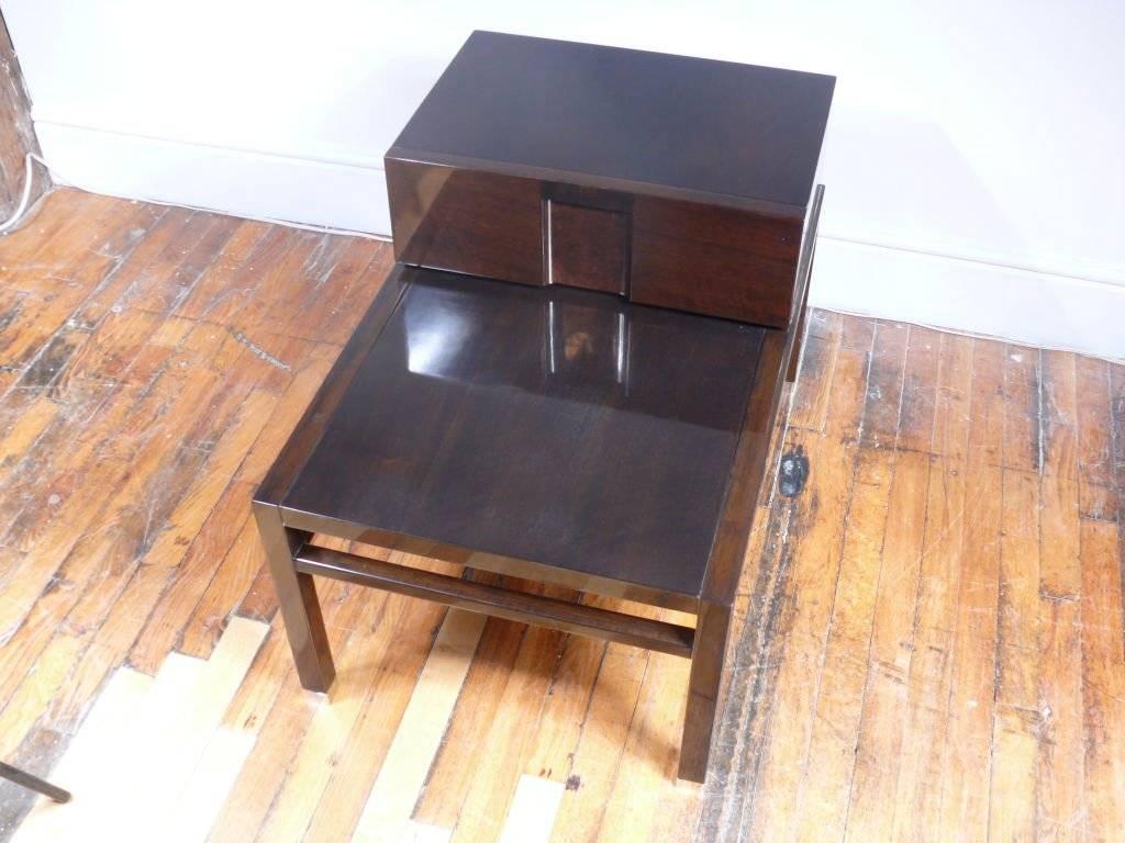 Pair of midcentury walnut end tables, two tiers with one drawer. Overall height 22