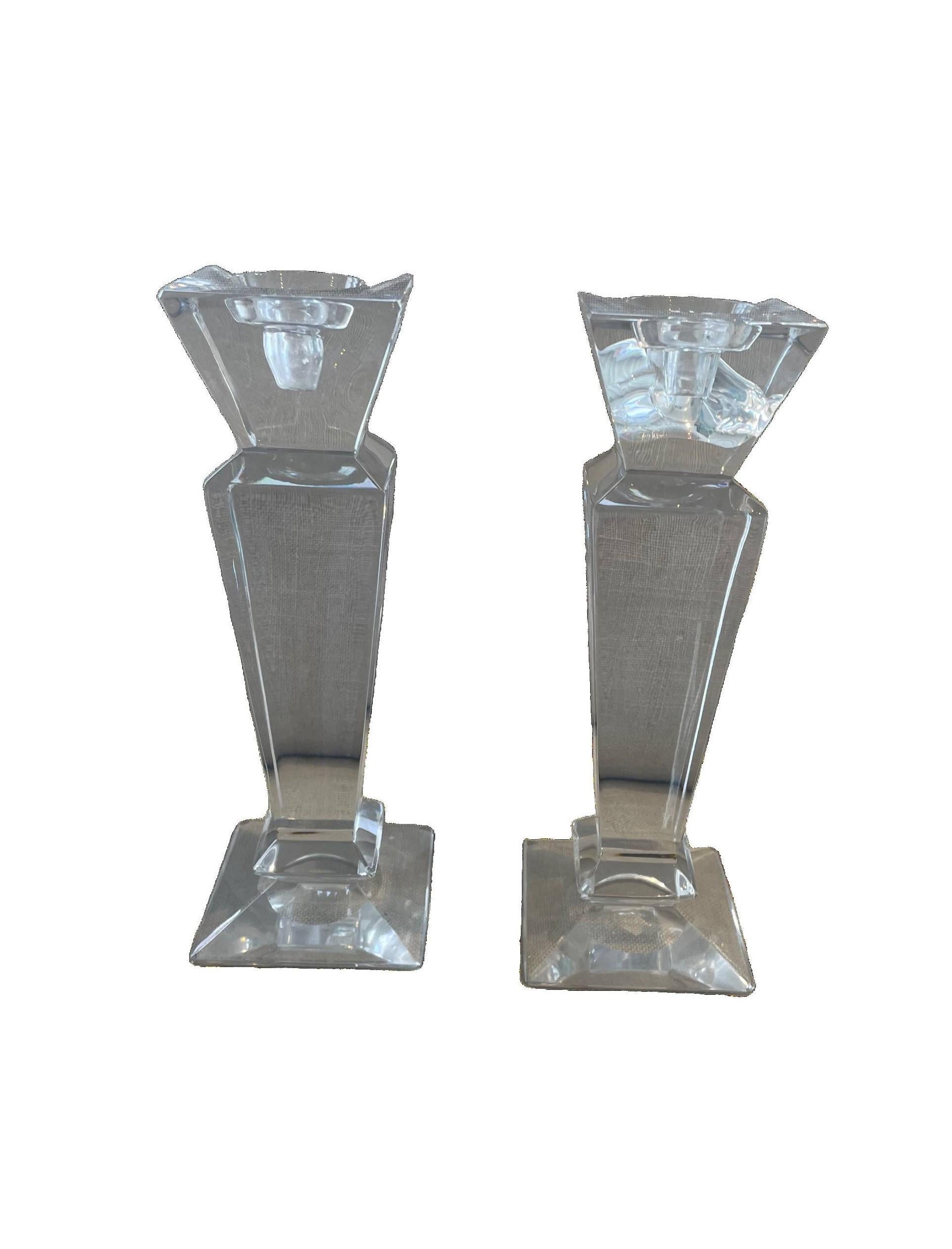 Solid glass candle holders from the pressed glass era (1930-1950). Solid, and pure in their simplicity.