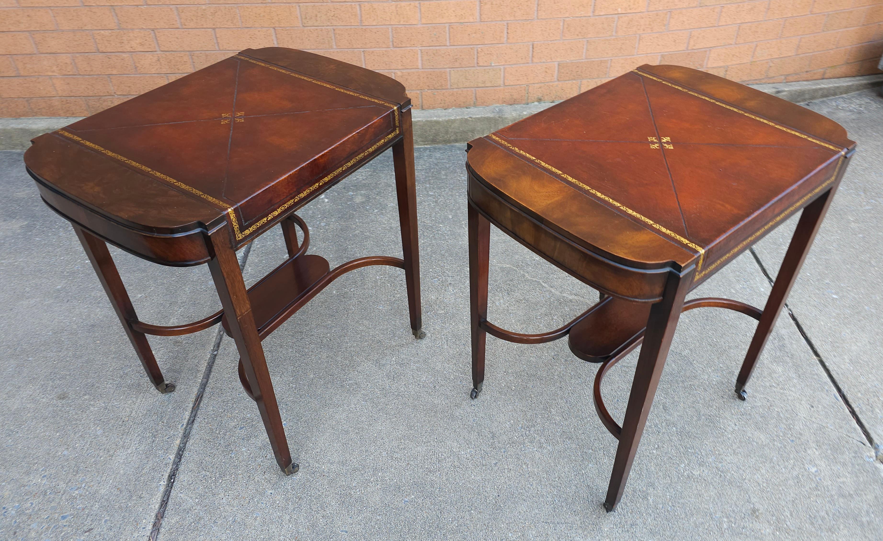 Pair Mid Century Regency Weiman Tooled Leather Top Mahogany Side Tables on Wheel In Good Condition For Sale In Germantown, MD