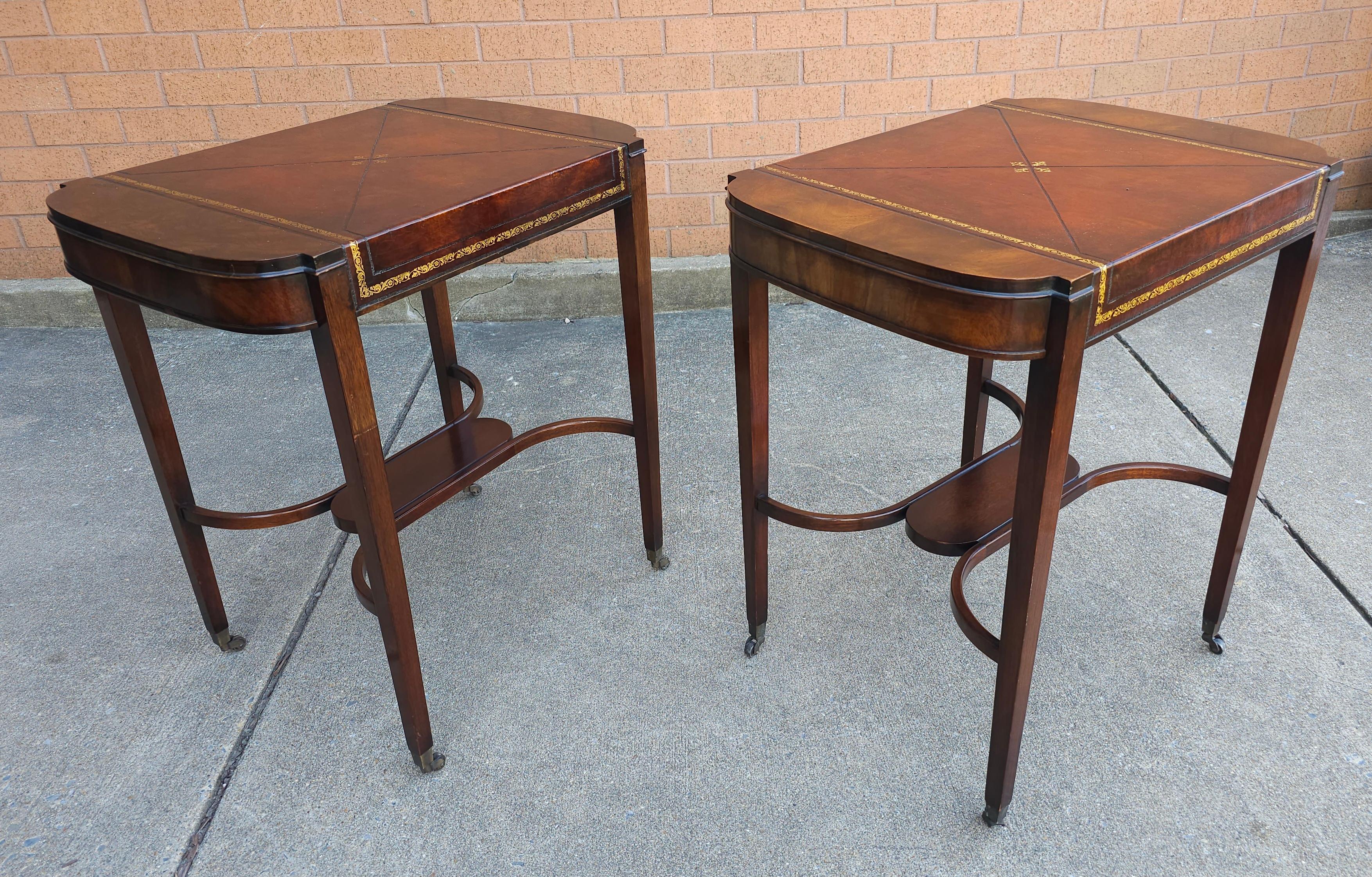 20th Century Pair Mid Century Regency Weiman Tooled Leather Top Mahogany Side Tables on Wheel For Sale