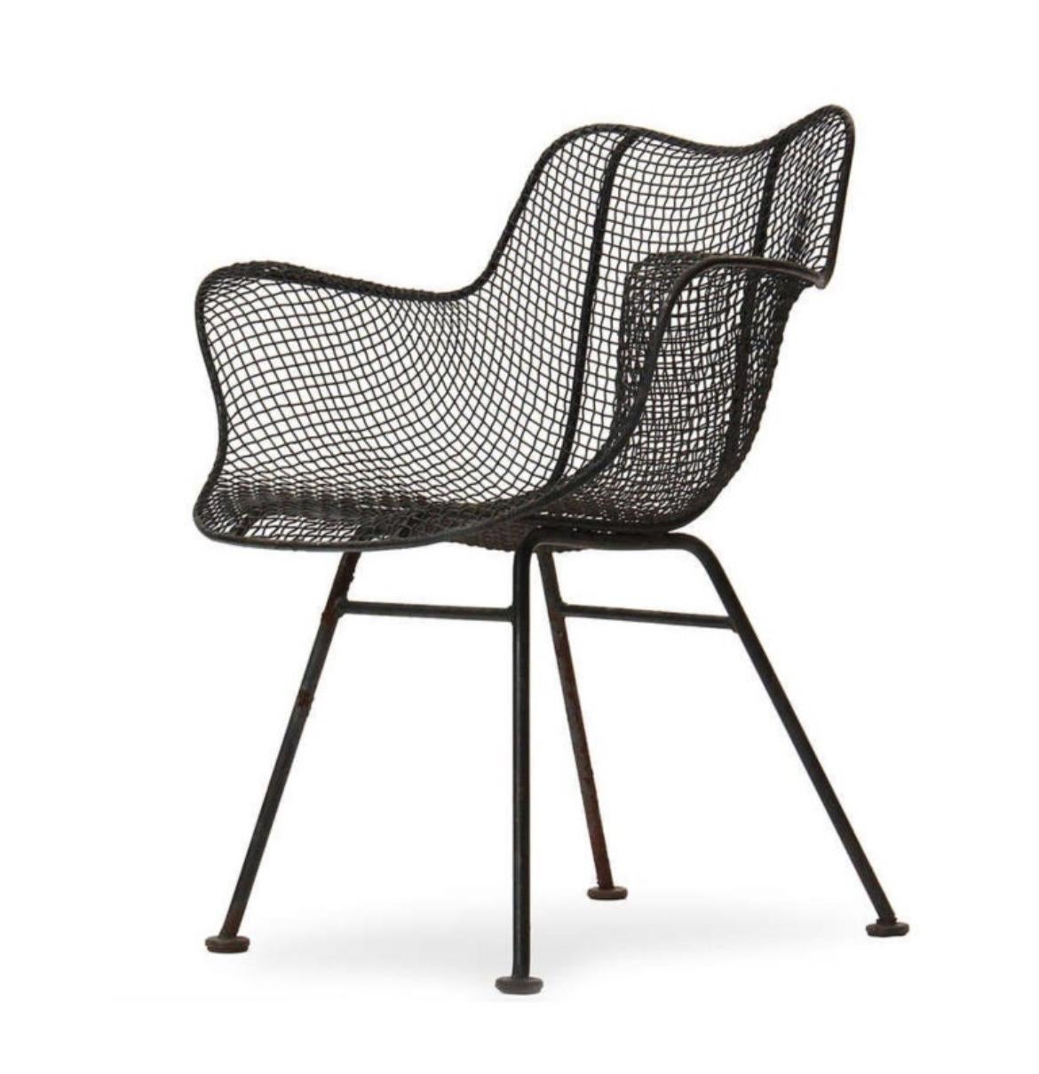 Pair of mid-century Russell Woodard sculptura mesh organically sculpted Patio armchairs. Very Iconic Designed outdoor Patio Chairs. All chairs are original Circa 1960 - they have been repainted with an outdoor black Satin paint. Chairs are original.