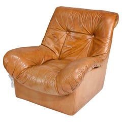 Pair Mid Century Scandinavian Danish modern Tan Leather Puffy Lounge Chairs