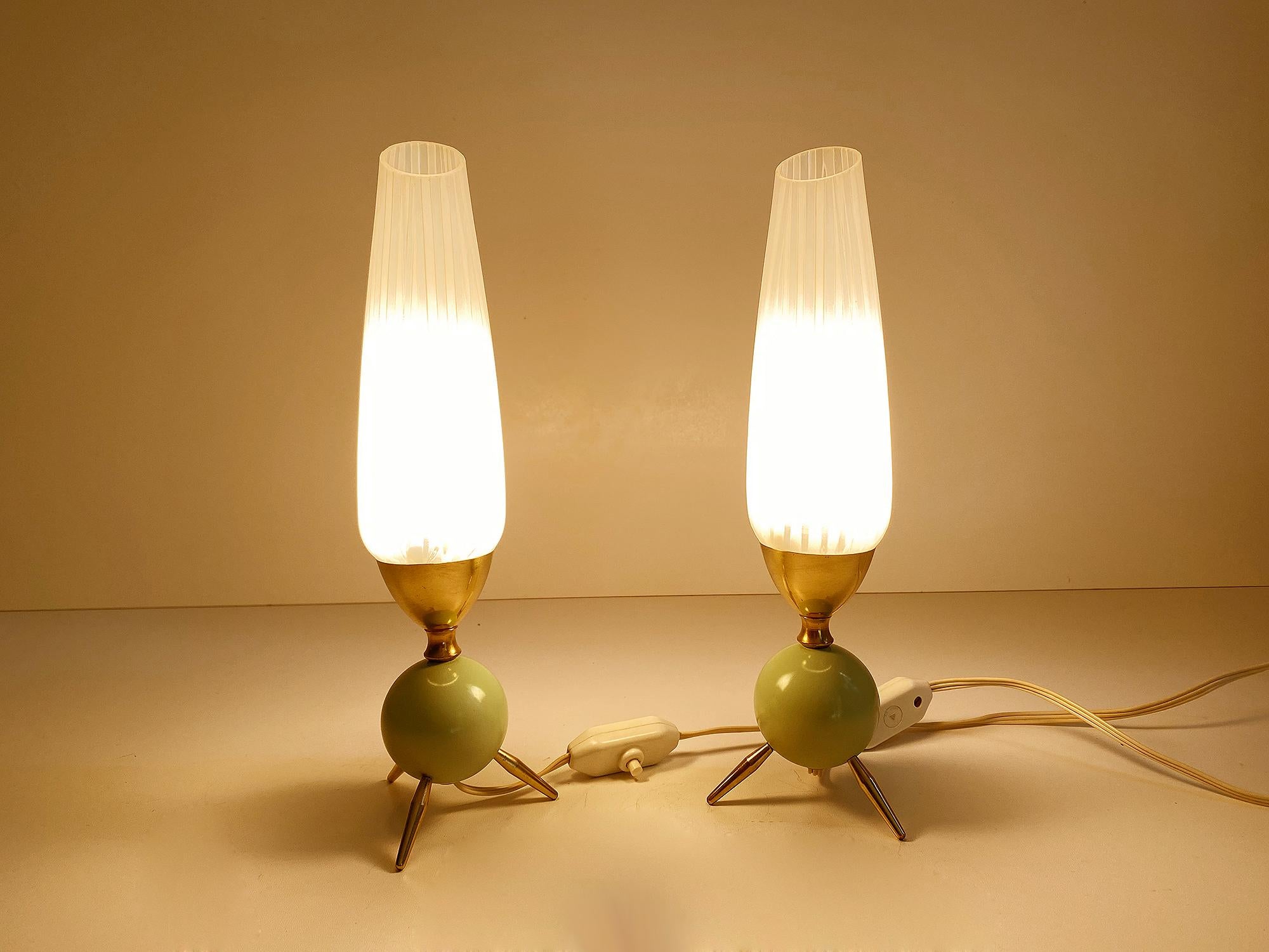 Pair of  1950s table lamps, unusual design with agreen enameled sphere base on brass tripod feet, chamfered. bulbous opaline glass shades with a pinstripe pattern. - fully rewired - The lamps have been tested with US American light bulbs under 120v