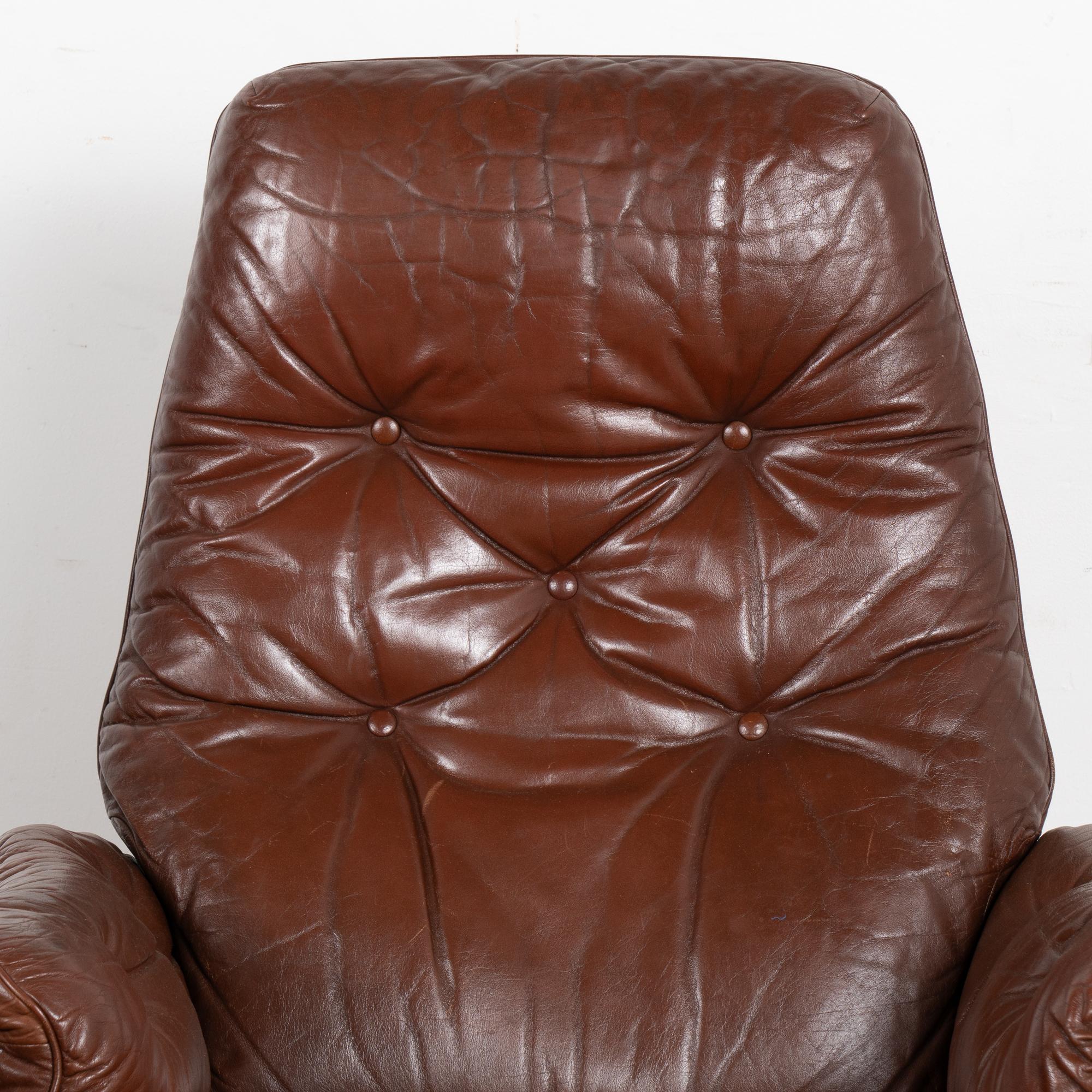Danish Pair, Mid Century Swivel Brown Leather Lounge Chairs, Denmark circa 1970