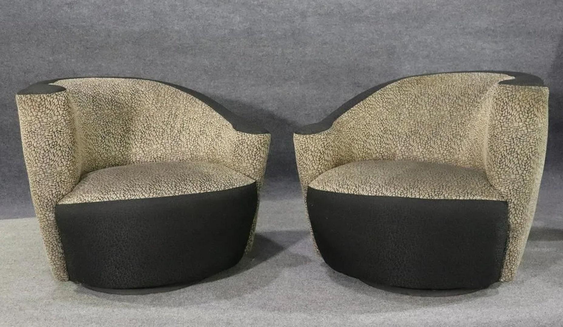 Pair of Mid-Century Modern swivel chairs in the style of Vladimir Kagan for Weiman. Wild shaped chairs on wheels with swivel action.
Please confirm location.