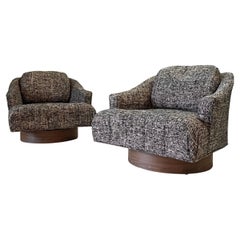 Pair Mid Century Swivel Tufted Chairs w/ Wood Wrapped Plinth, Black and White