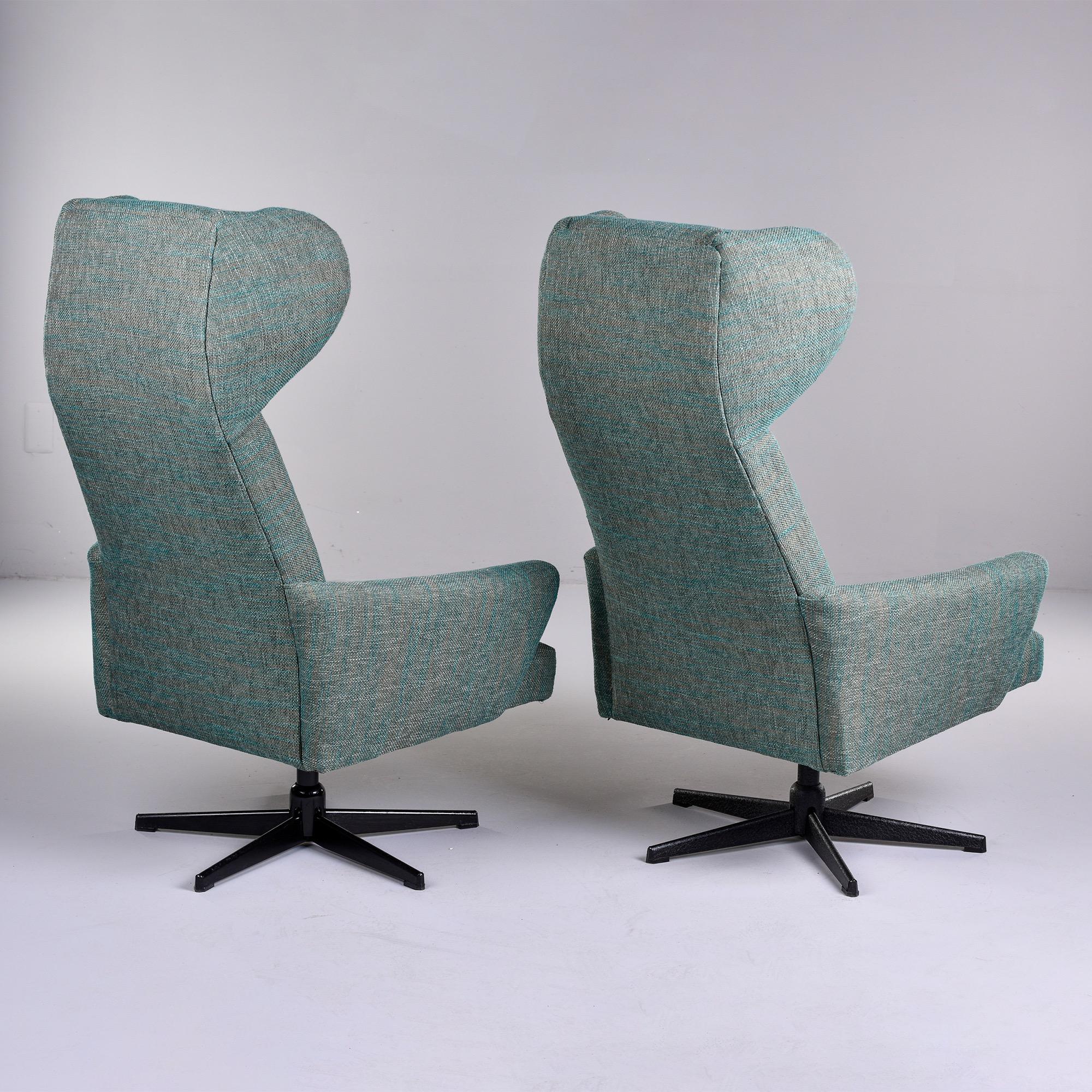 Mid-Century Modern Pair Mid Century Tall Sculptural Wing Back Swivel Chairs with New Upholstery For Sale