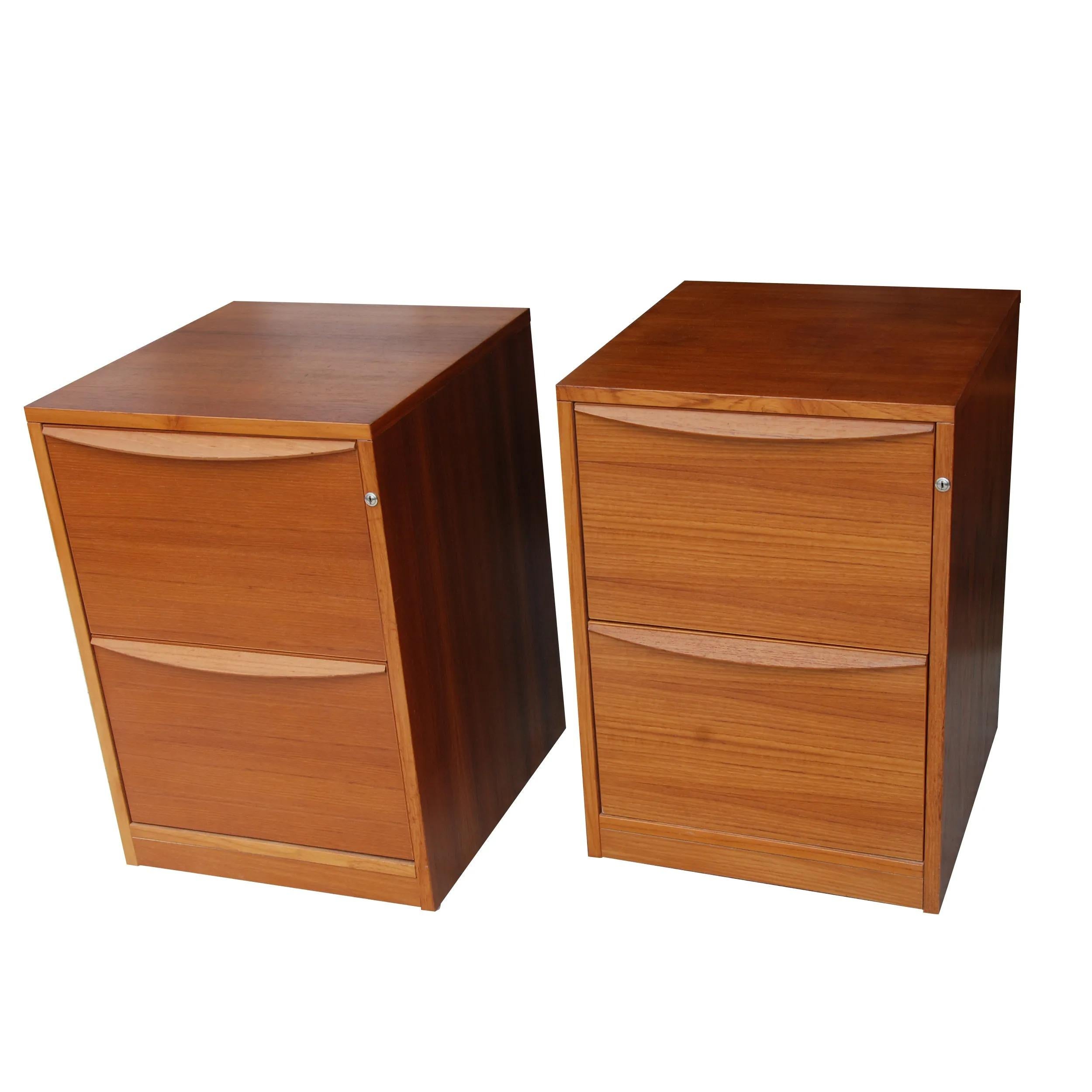 Pair mid-century teak file cabinets on casters.

Nice mid-century on castors. Ample storage.