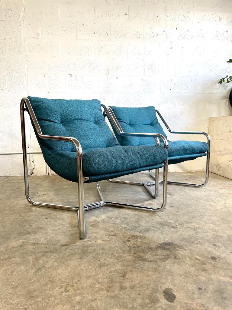 Pair Mid Century Modern Tubular Sling Chairs by Unarco. 