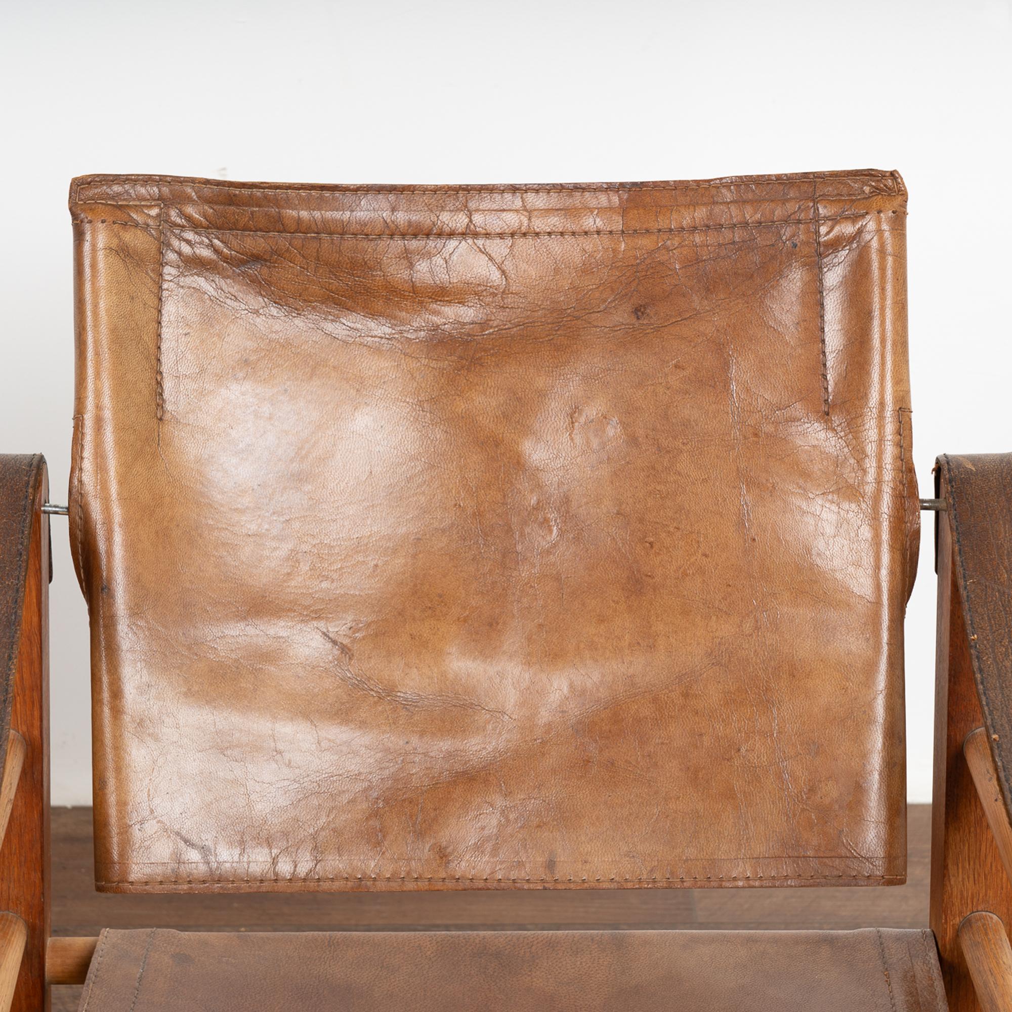Danish Pair, Mid Century Vintage Leather Safari Chairs and Ottoman, Denmark 1960's