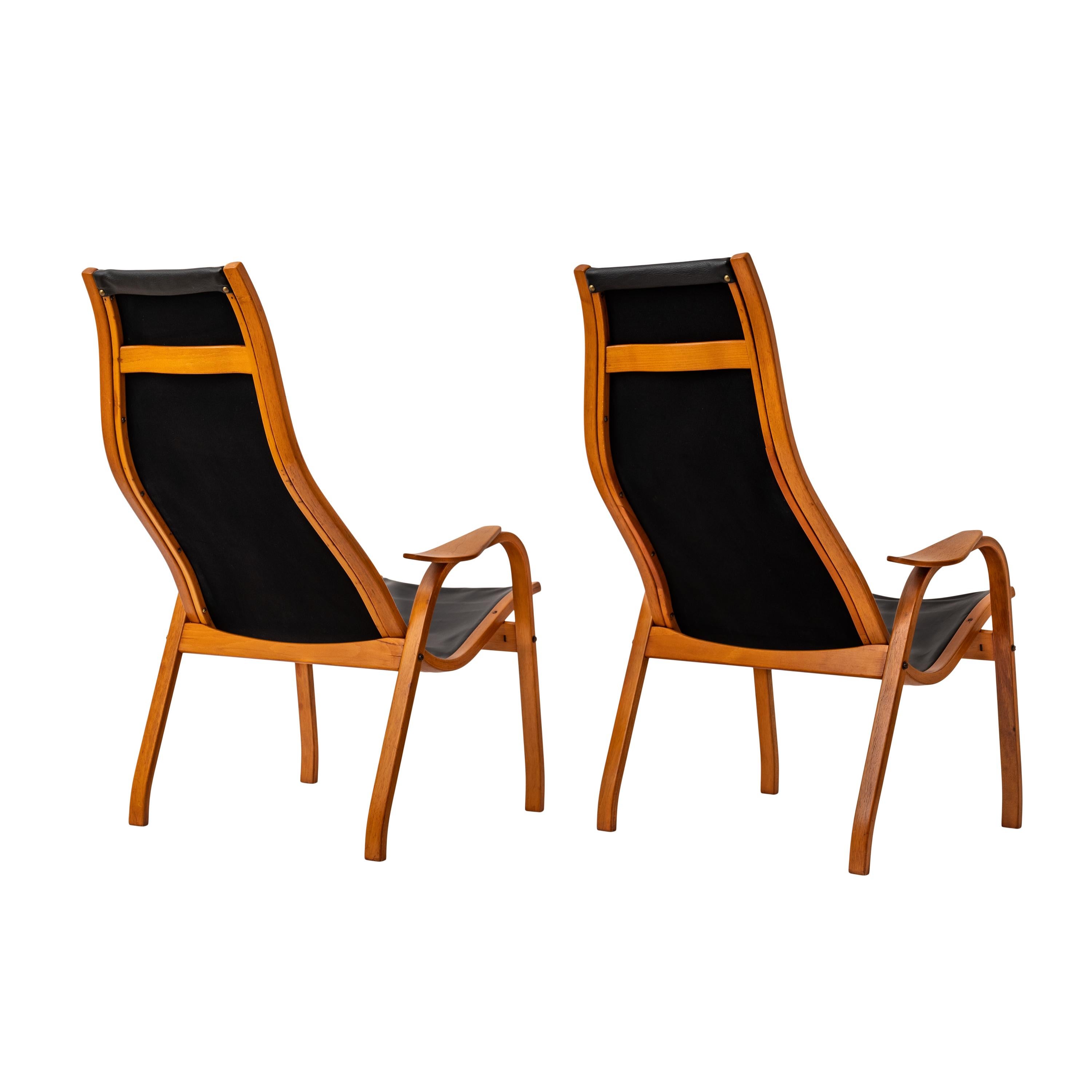 20th Century Pair Mid Century Yngve Ekstrom Swedese Lamino Black Leather Lounge Chairs, 1950s