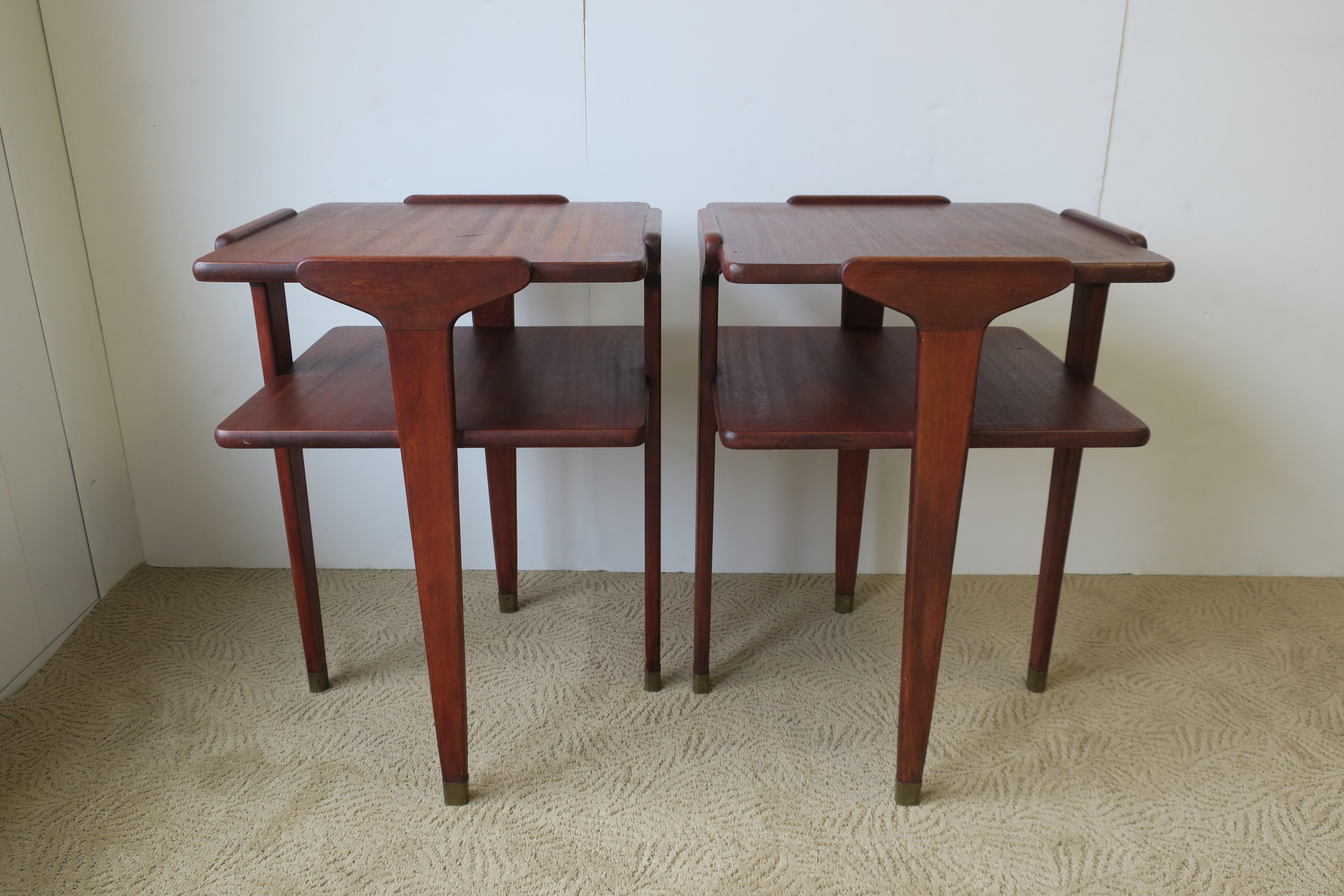 A beautiful and very well made pair of wood end tables or night stand [nightstand] tables, with shelf and sleek leg design from top to bottom, including brass accent at base. 

