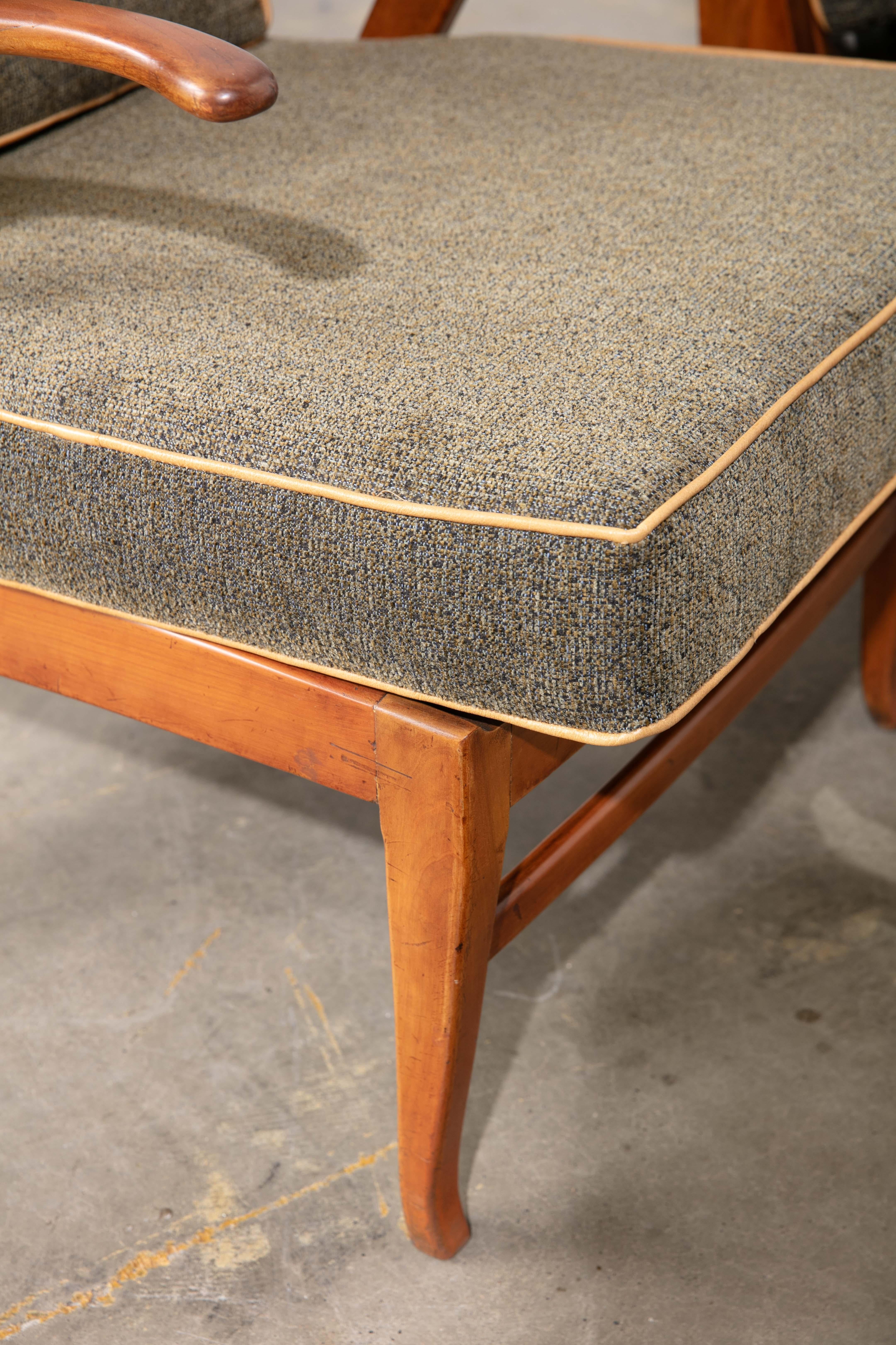 Pair of Mid-Century Modern Scandinavian lounge/reclining chairs with new upholstery. Very unique slotted reclining system. Leather welt and button tufting to seat back. High quality pair of chairs. Beautiful from every angle and very comfortable!
